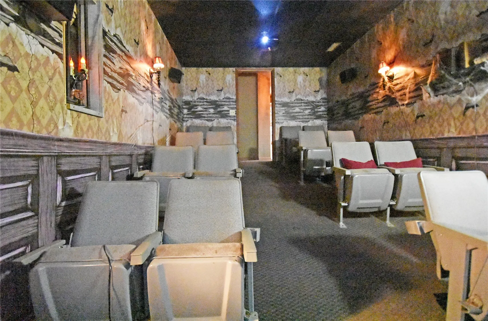 16 seat theater room with giant screen