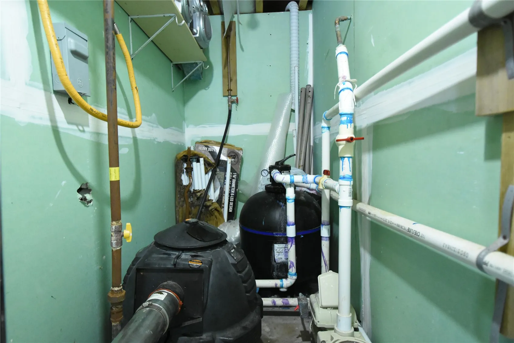 Equipment room houses the heater and filter