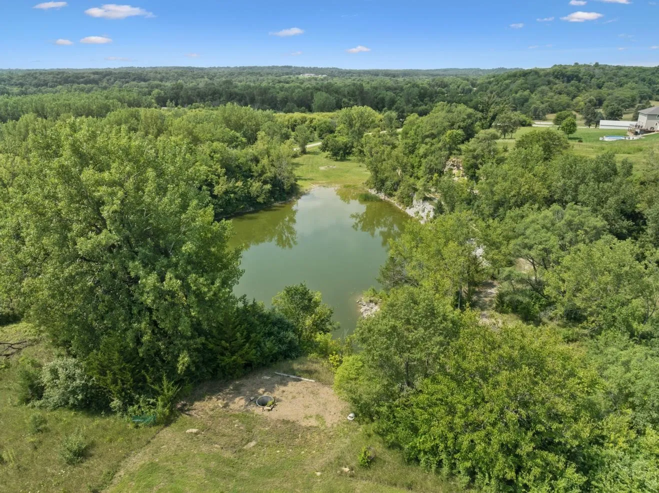 Overlook to pond with bonfire pit