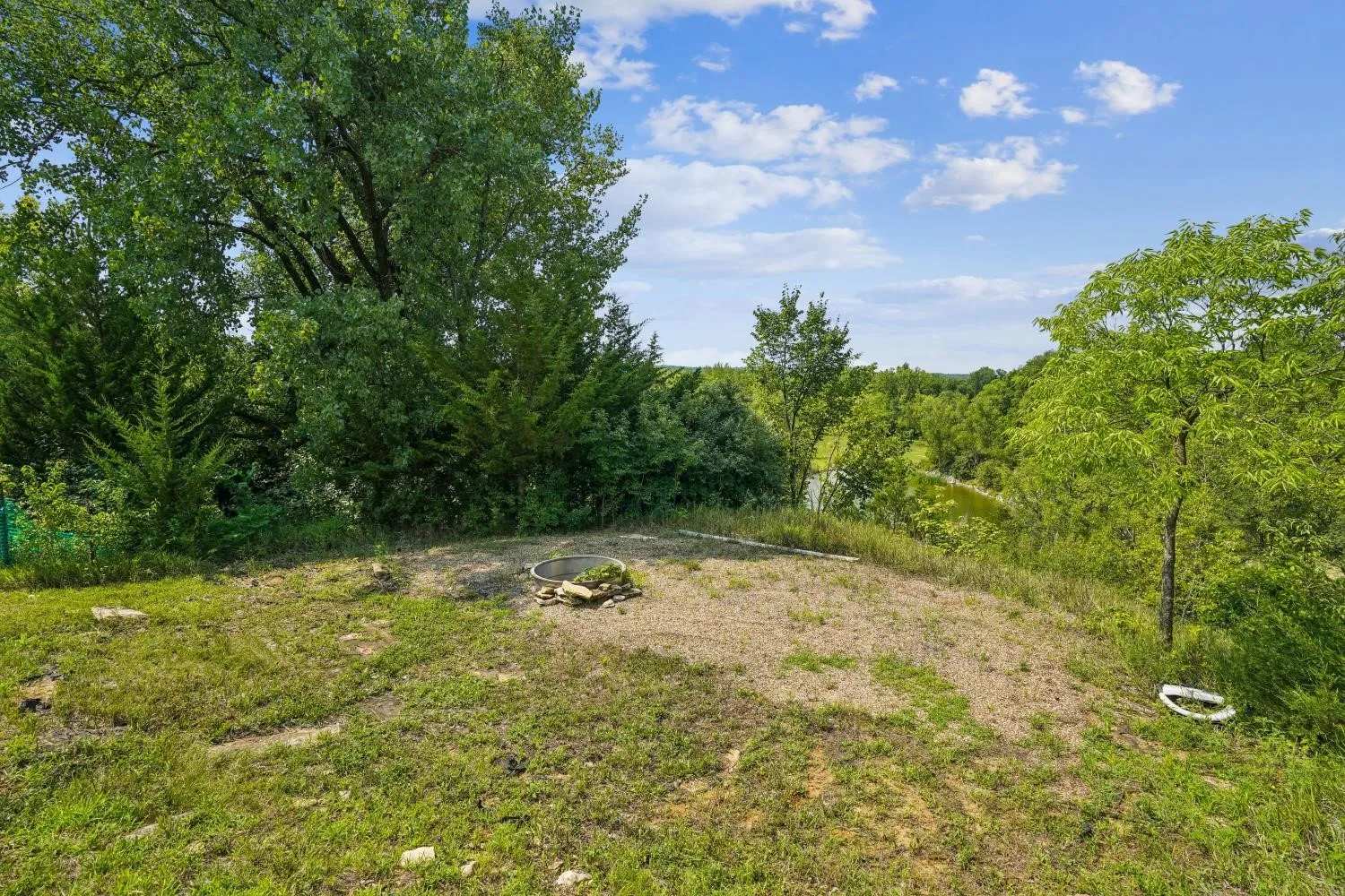 Bonfire pit overlooking pond