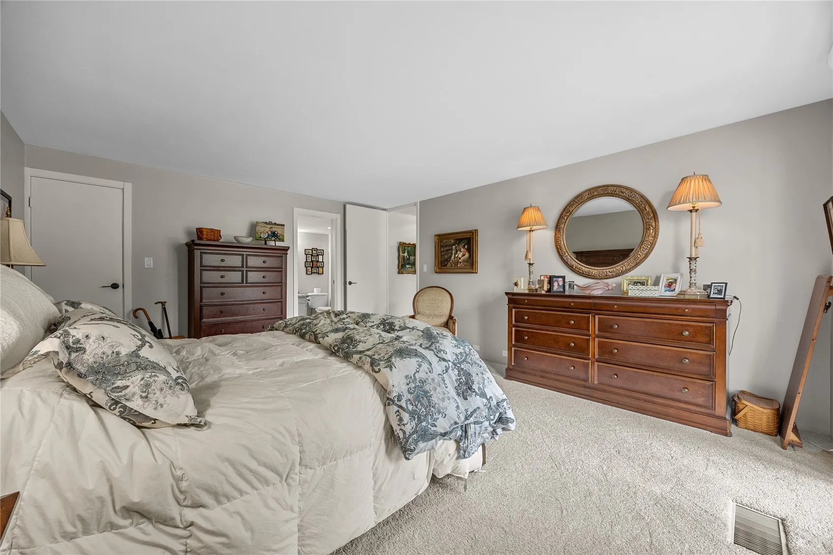 Primary bedroom, spacious and bright.