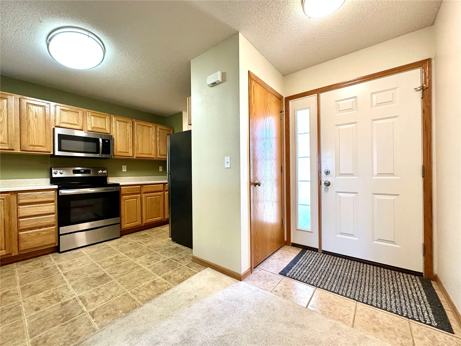 Front Door Entrance with Coat Closet.