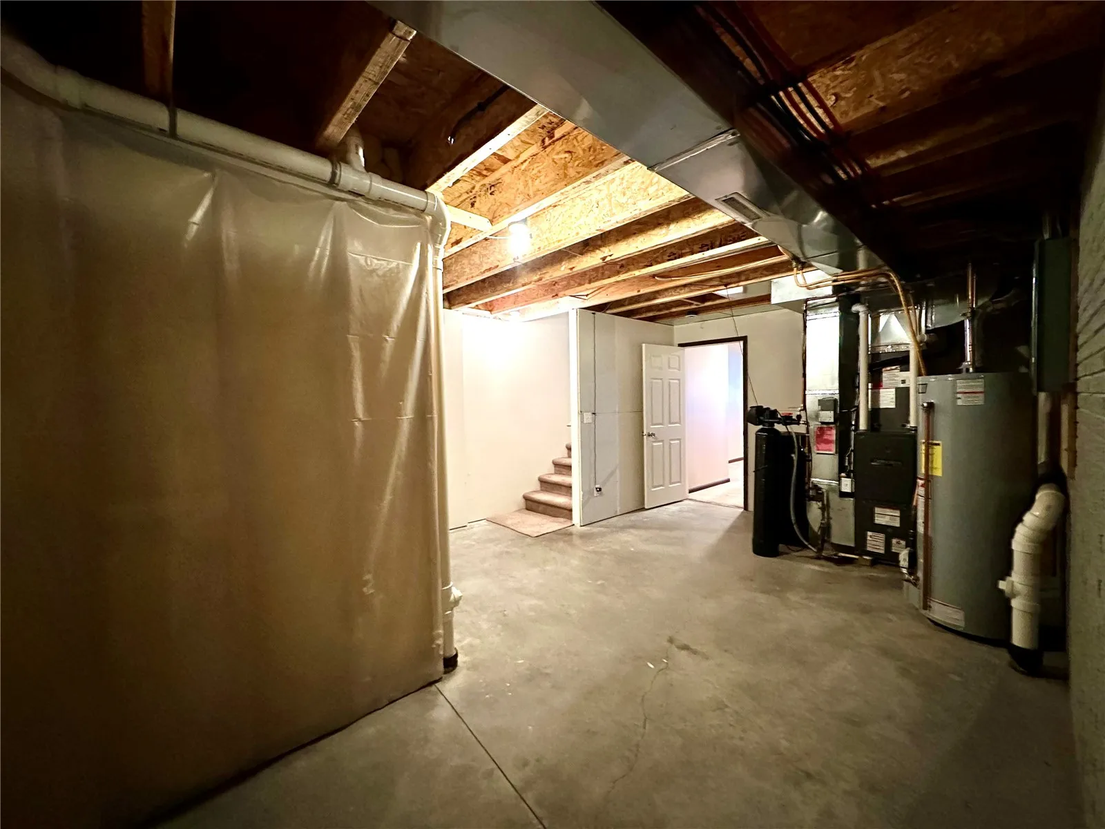 LOts of Storage in Utility Room. Area can be finished with lower level bathroom.