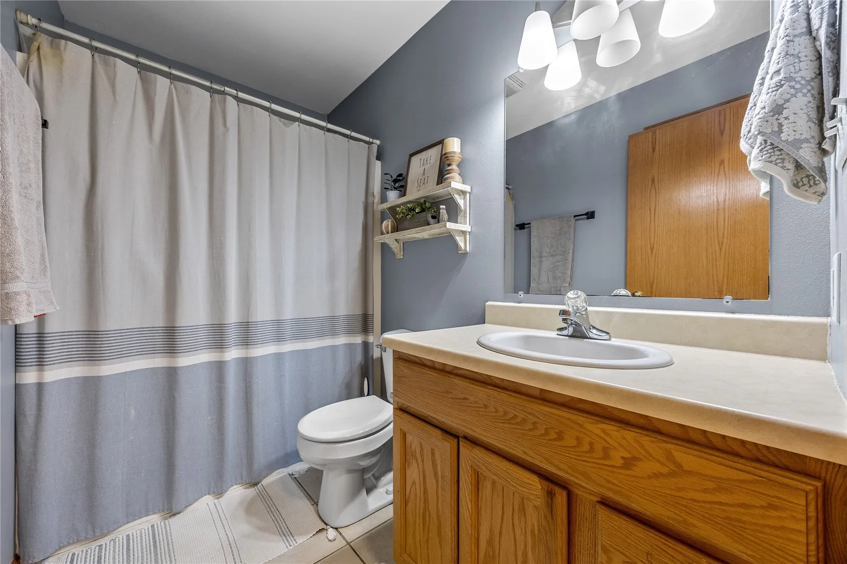 Full bathroom upstairs. Located adjacent to the two upstairs bedrooms.