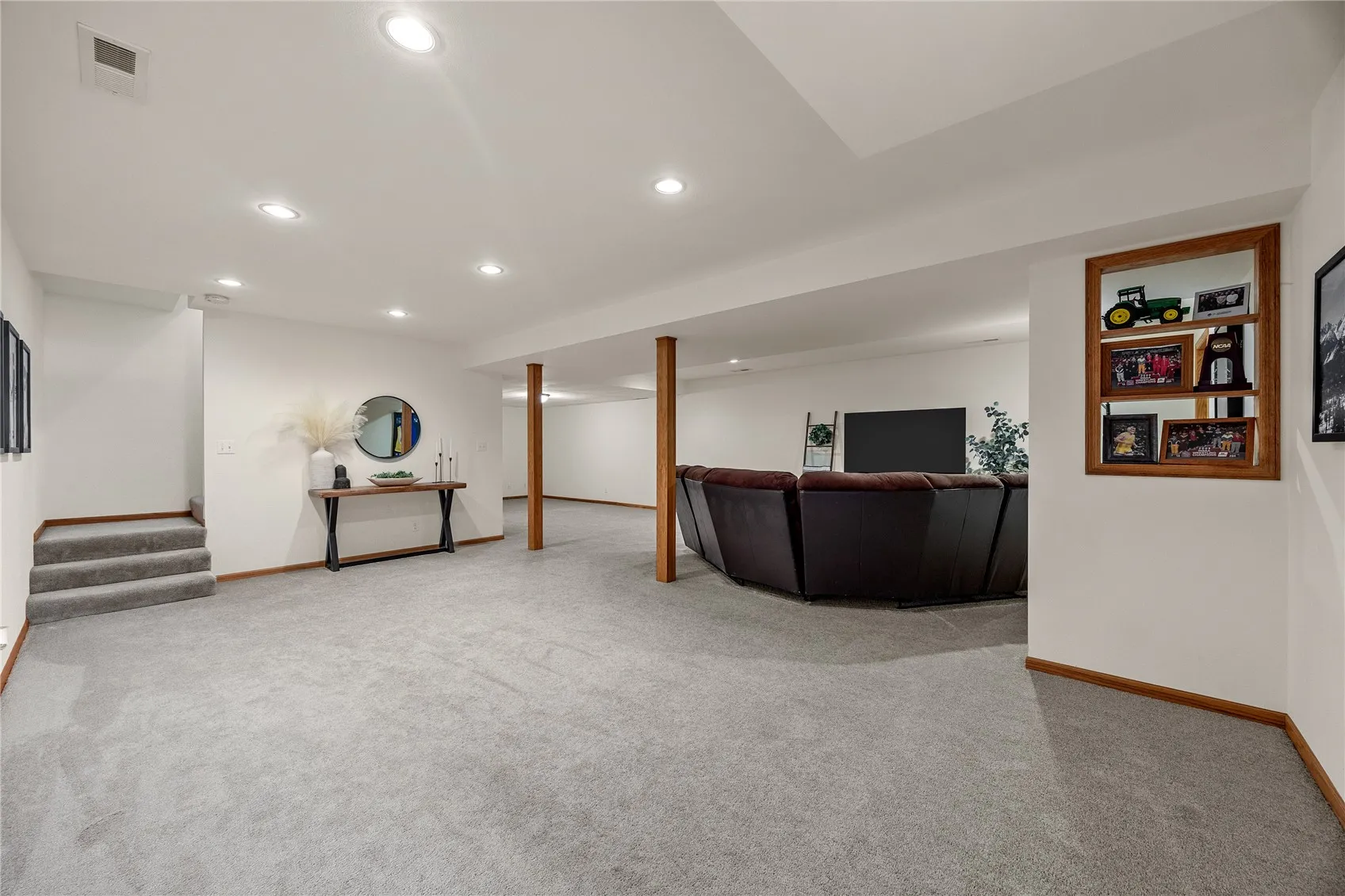 LARGE family room and play area in lower area.