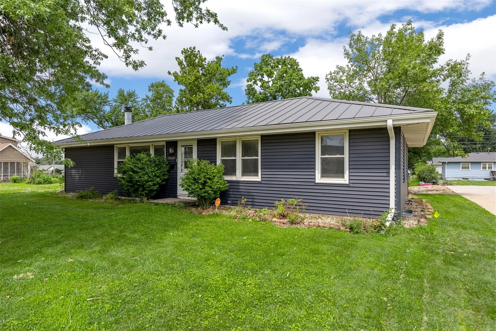 Vinyl siding, metal roof for easy care