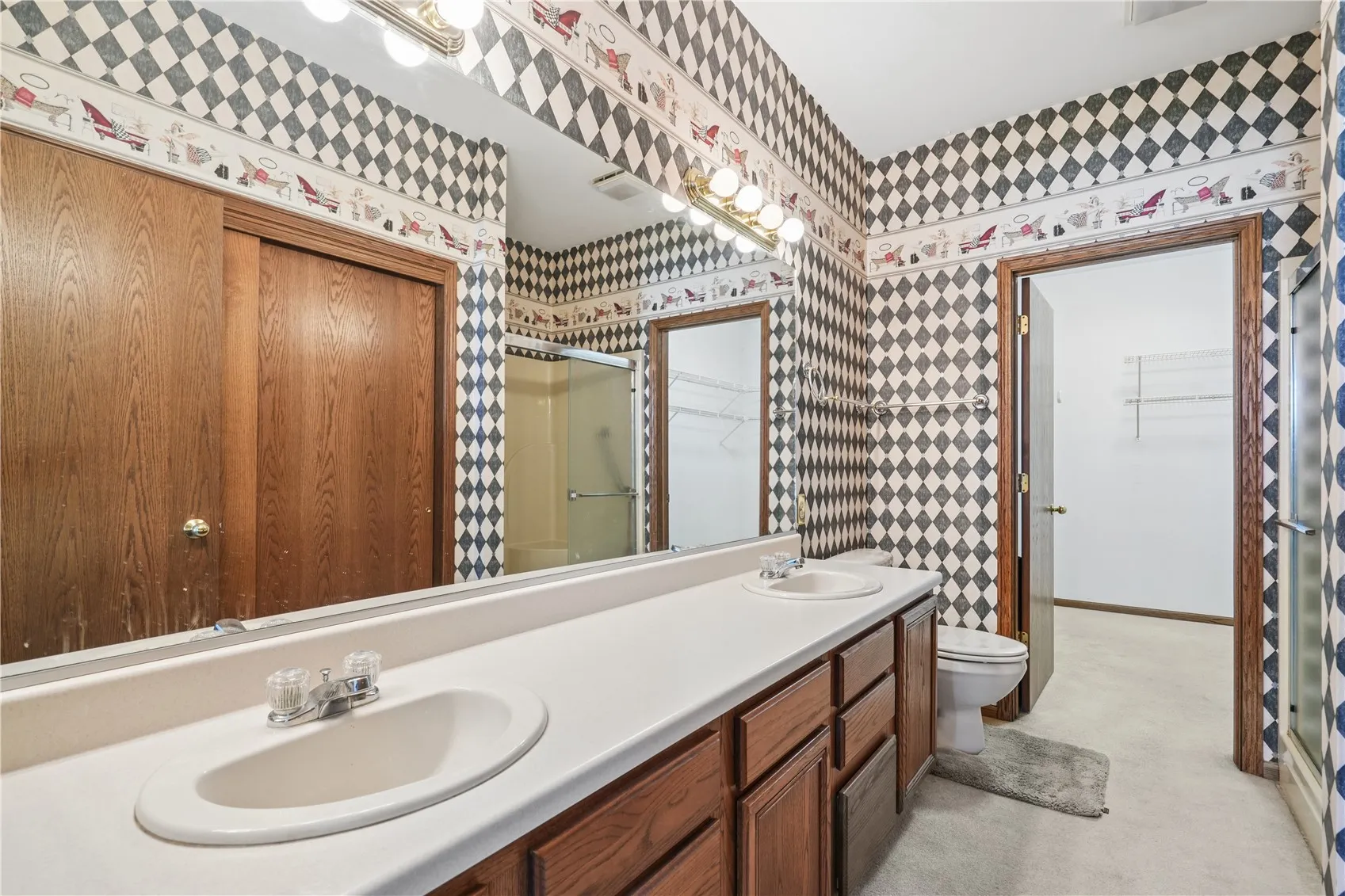 Primary bathroom with shower and double vanity