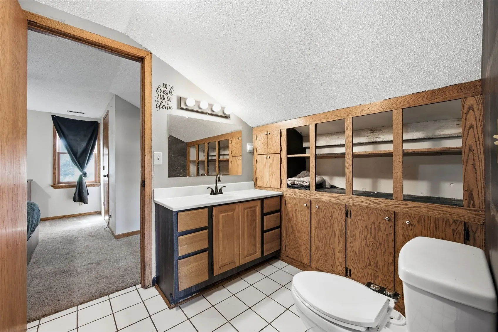 Upper unit full bath w/plenty of storage