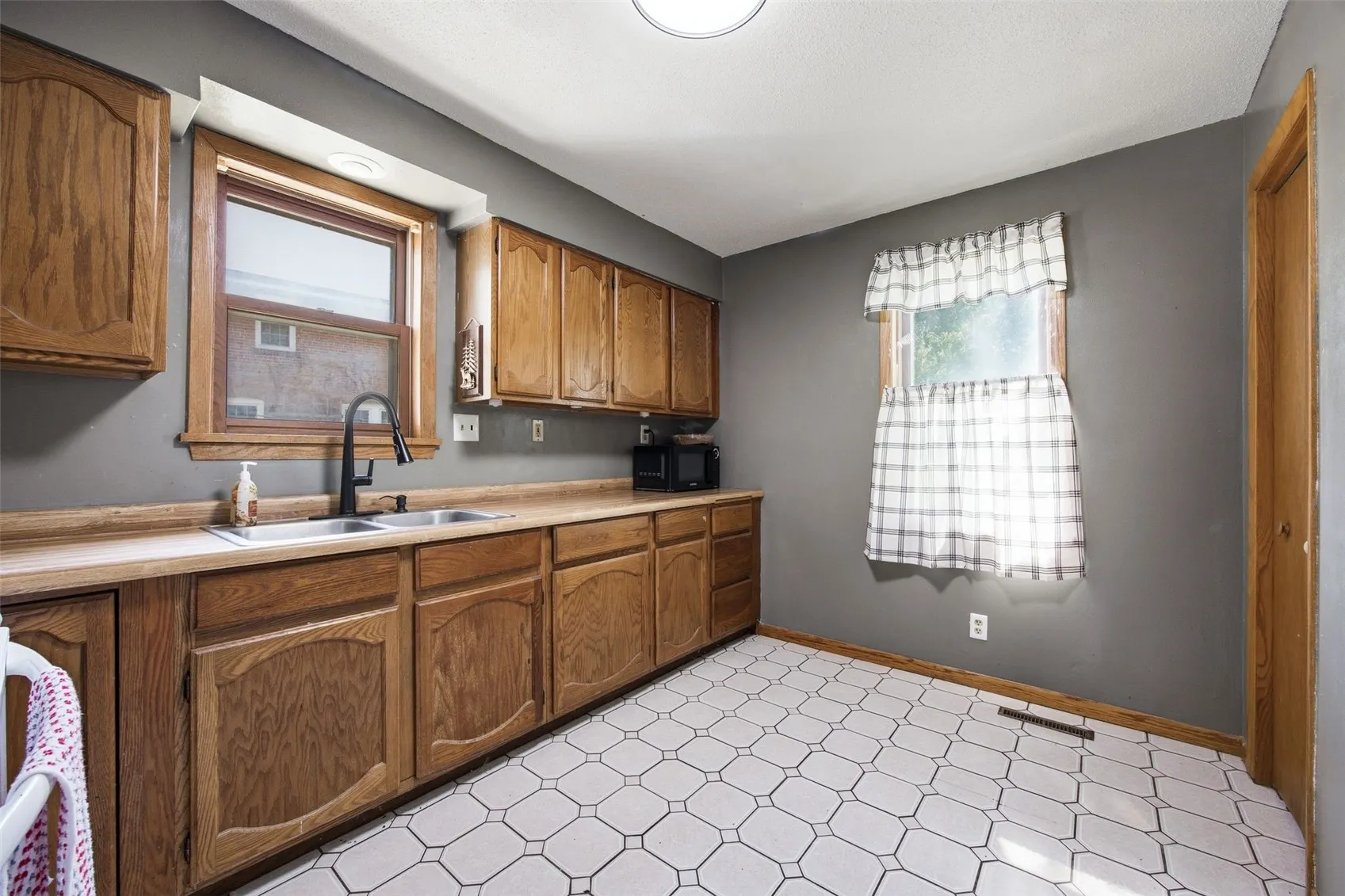 Pantry closet & lots of cupboards in main level kitchen