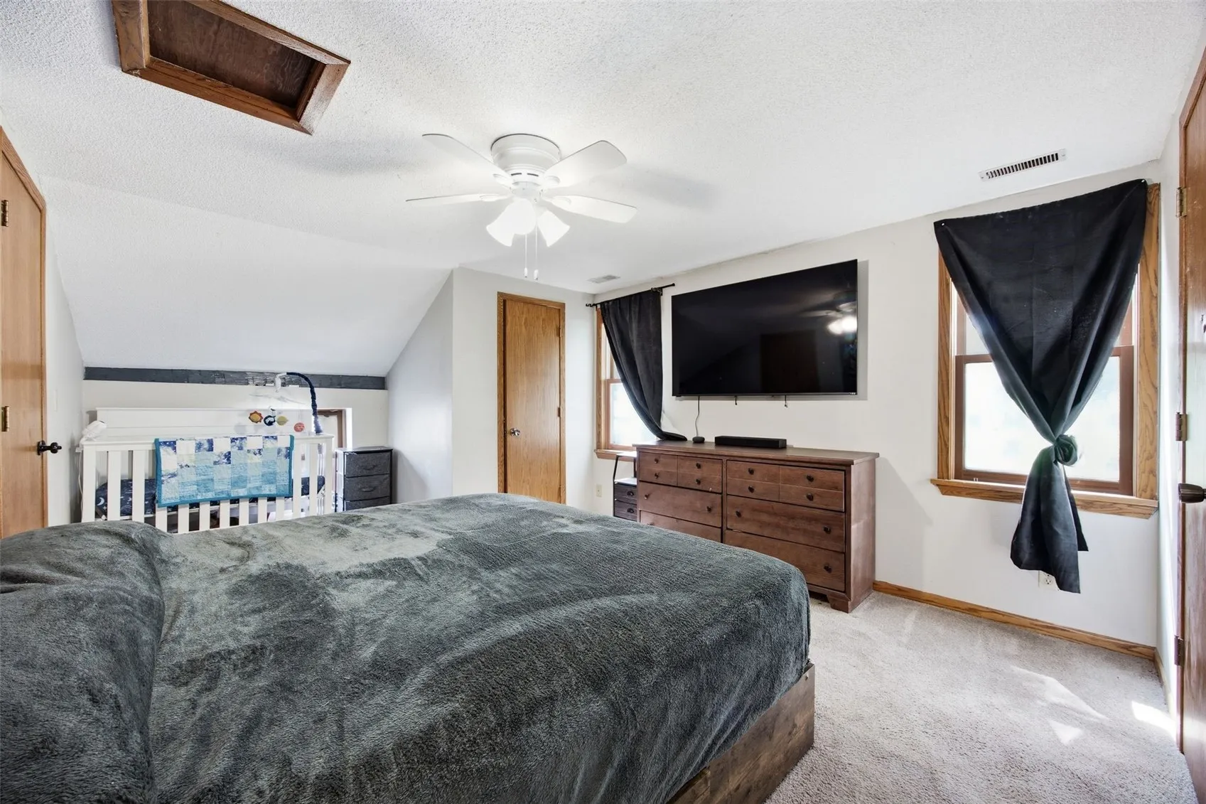 Upper unit primary bedroom w/2 closets!