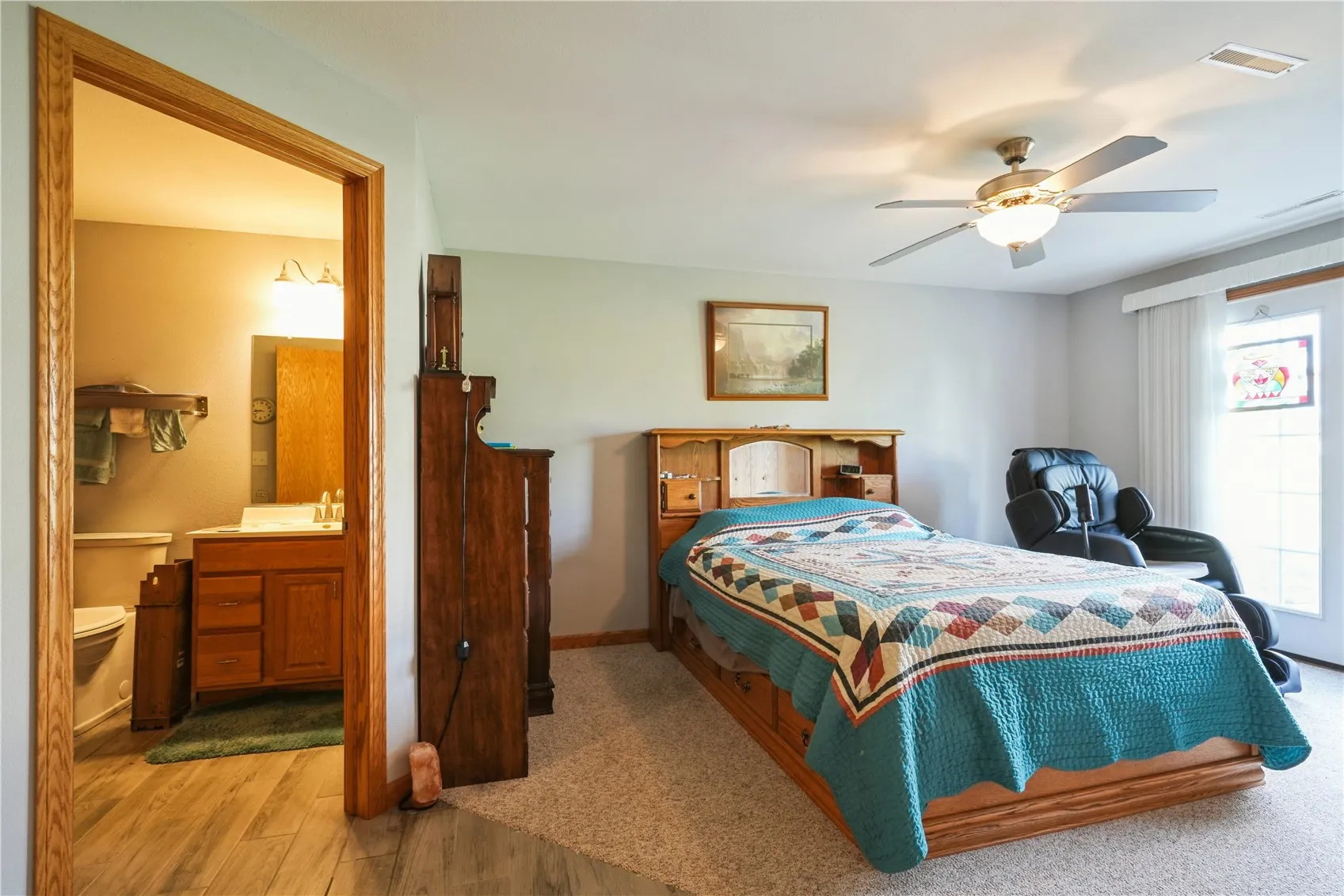 Lower level bedroom & bathroom (visually altered)