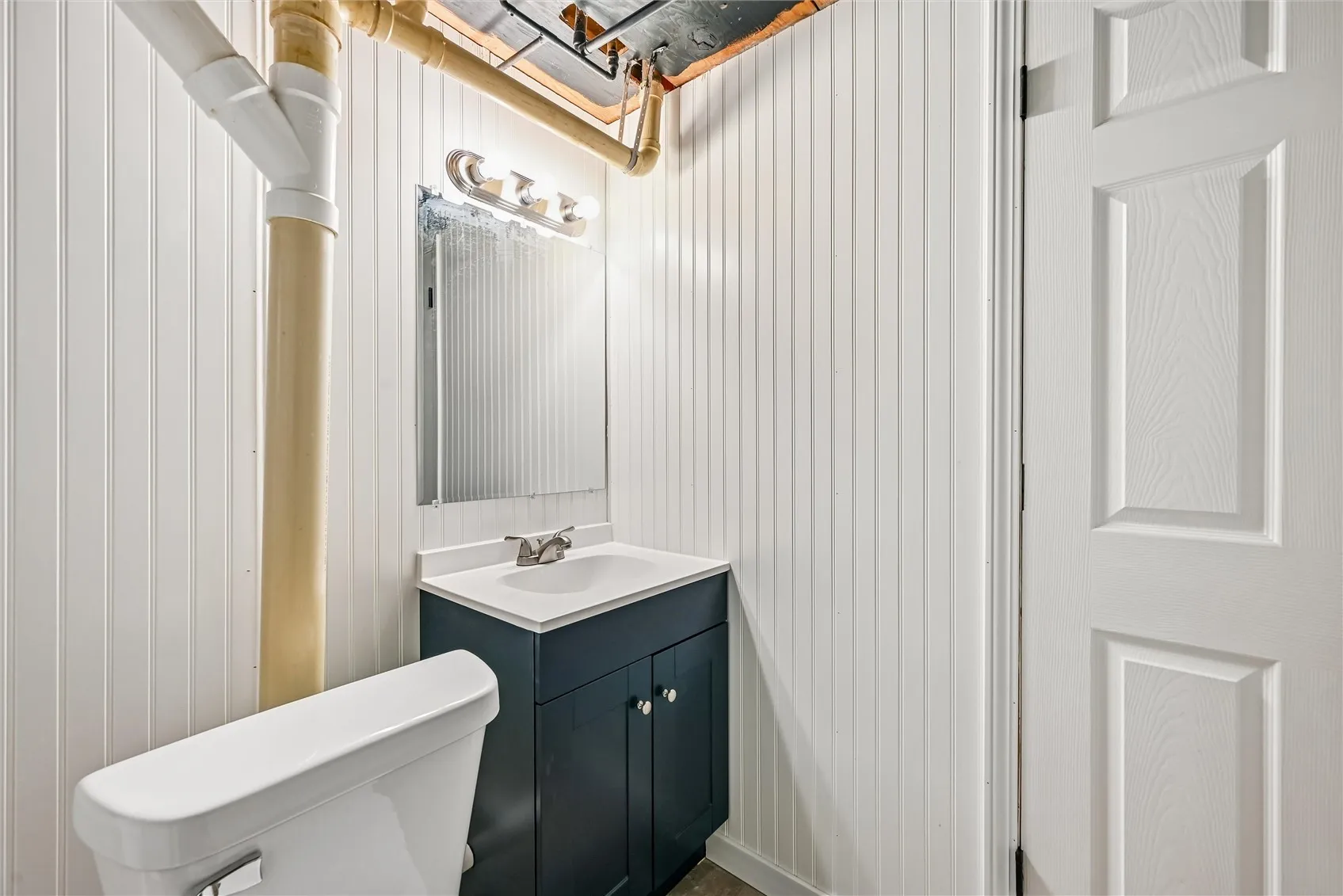 Lower level half bathroom