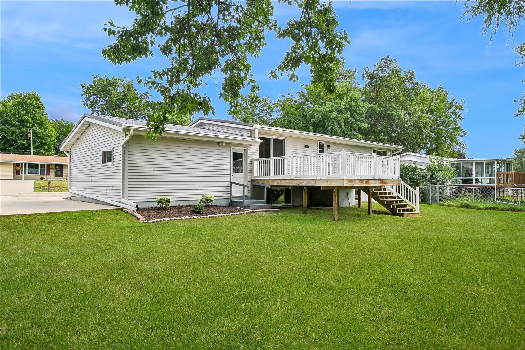 Back door to the garage, extra parking, deck