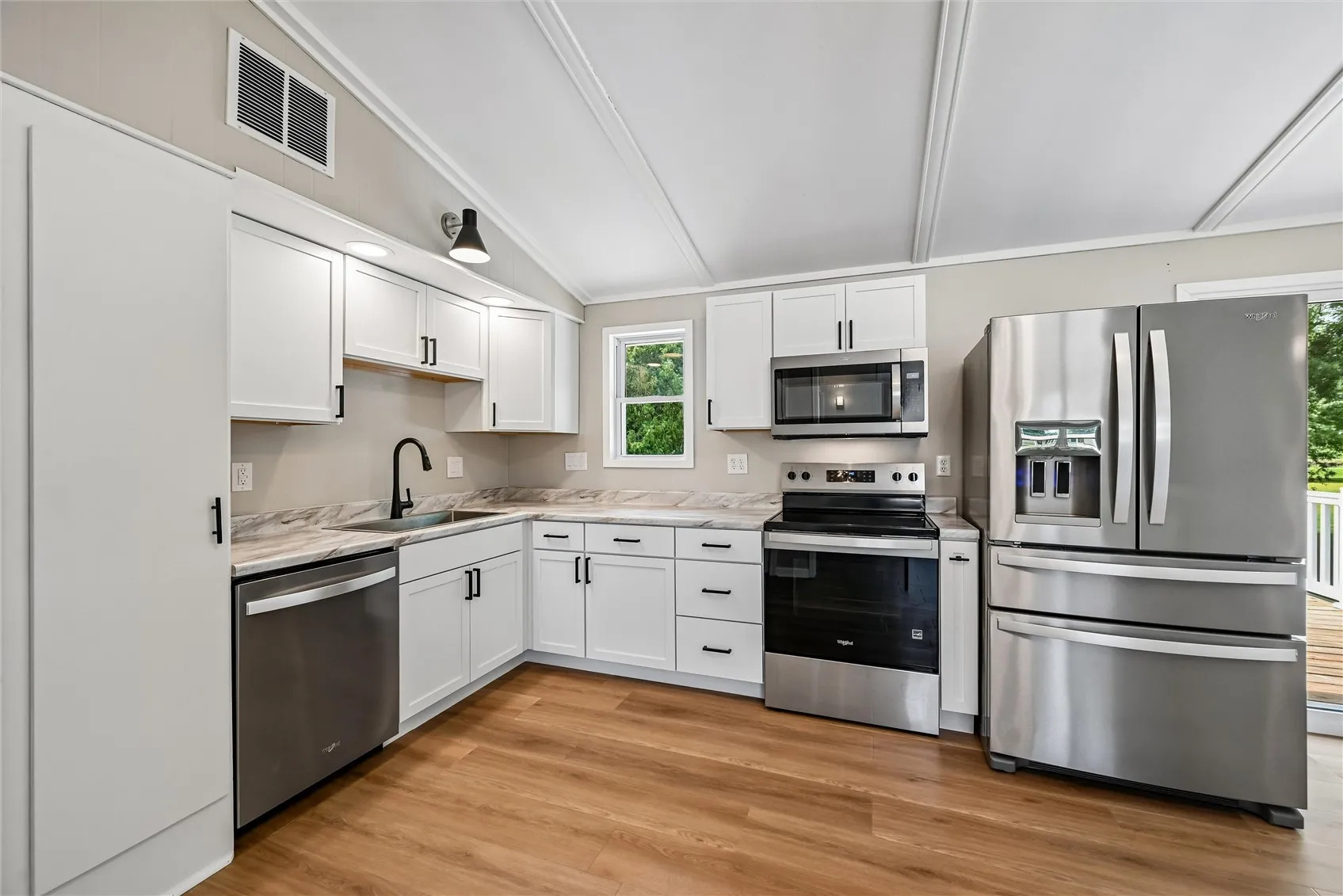 New cabinets, counters, appliances, lighting!