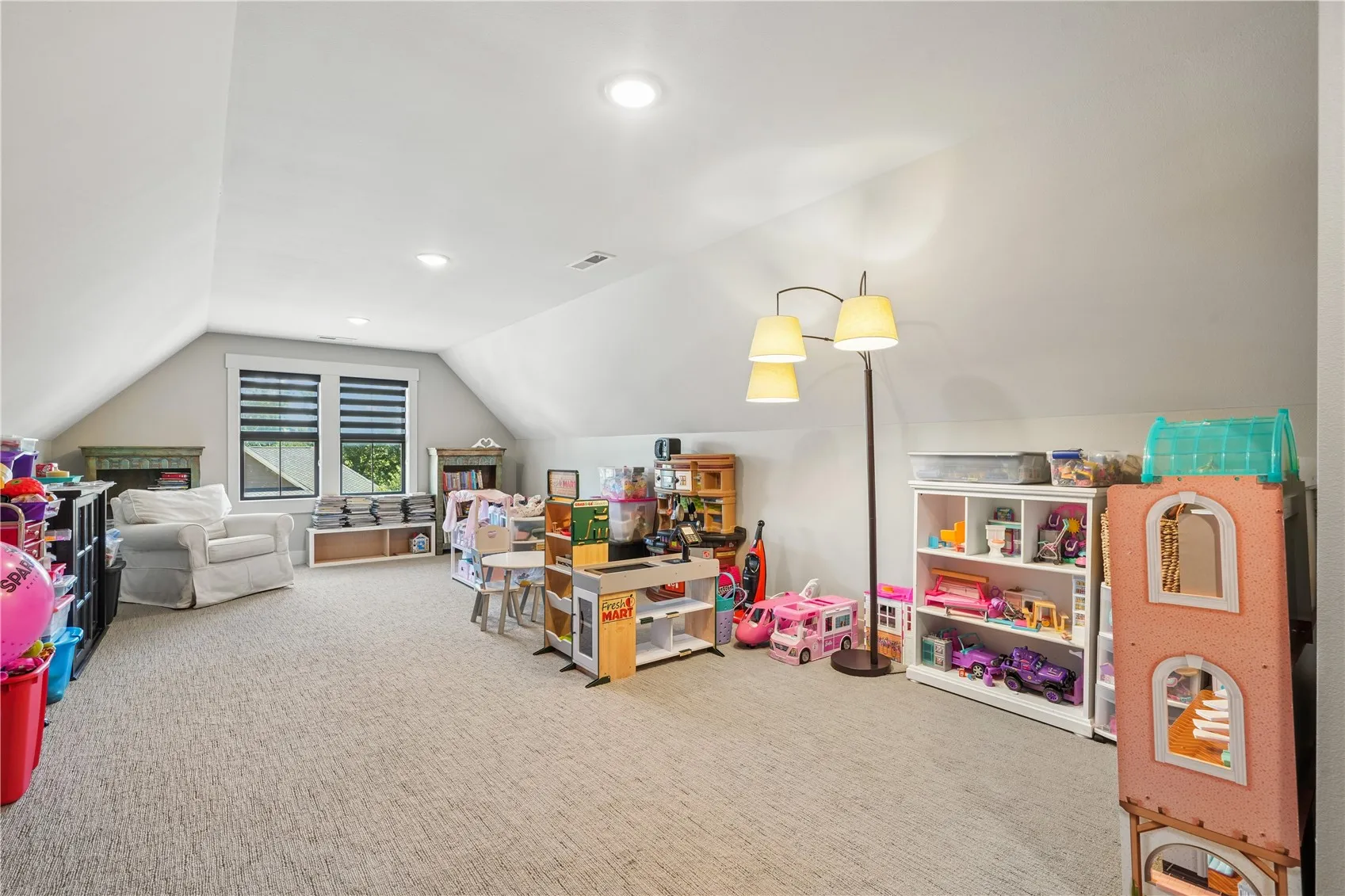 Generous bonus room above the garage with custom blinds and a walkin closet.