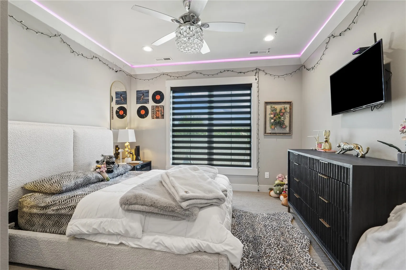 Bedroom 2 with custom blinds, LED lighting in crown moulding and walk-in closet.