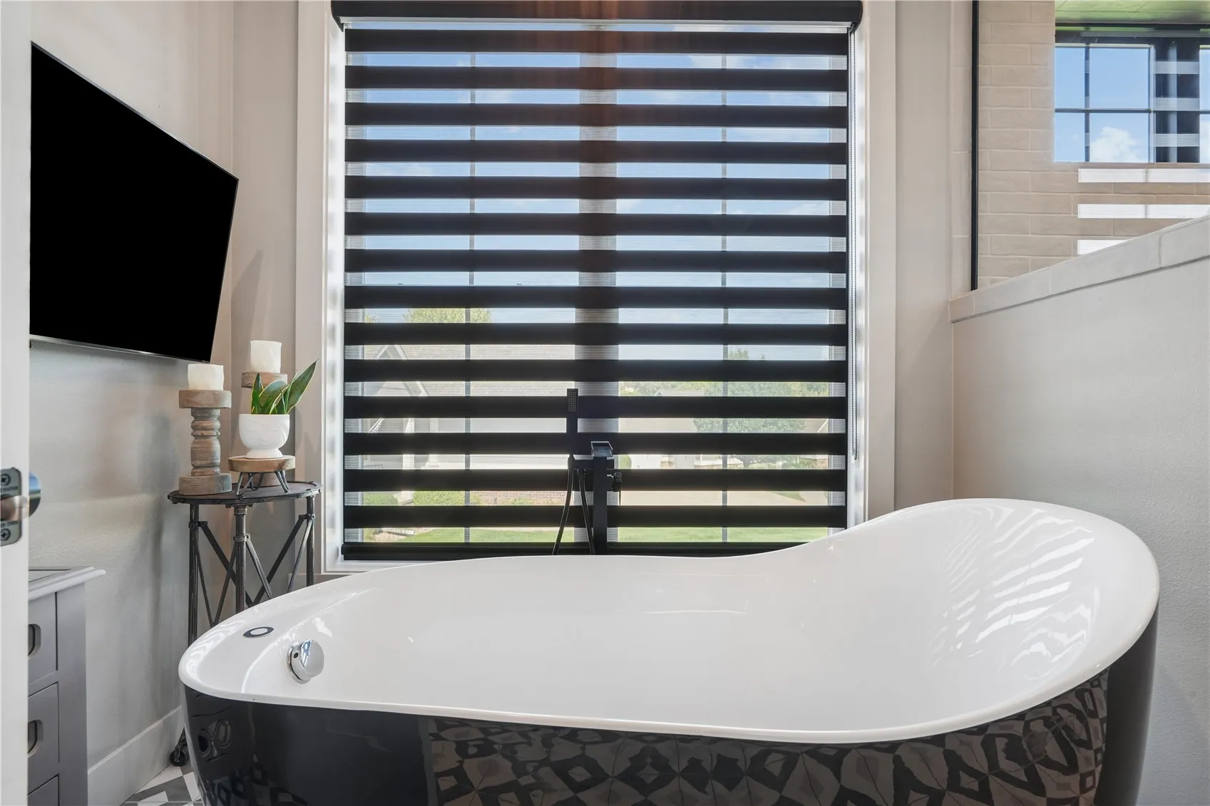 Stunning free standing air soaker tub.