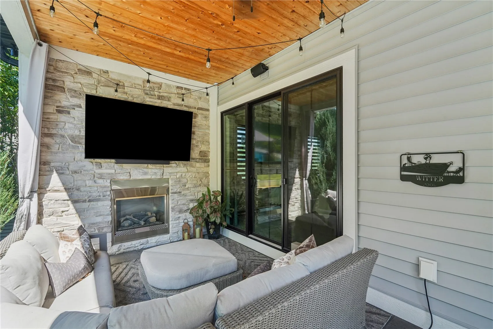 Covered Porch/Patio with access from the Primary Bedroom.