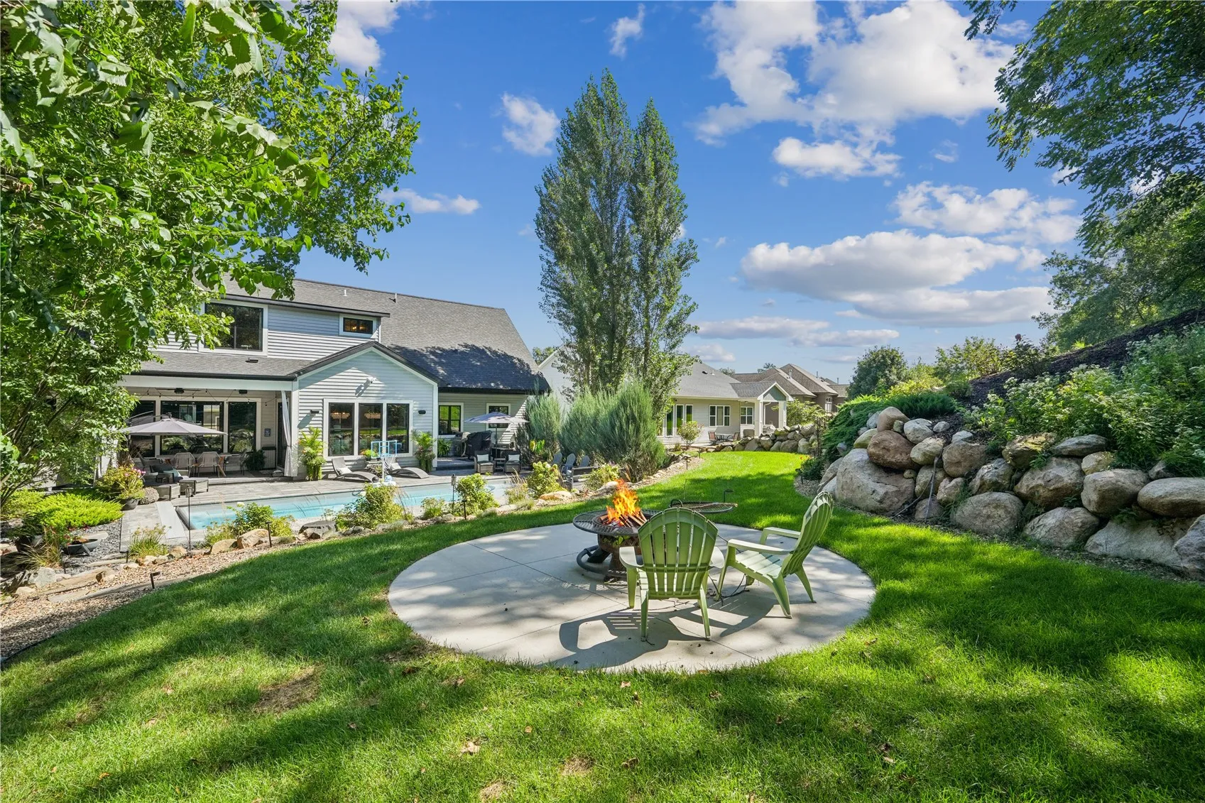 View from the rear of the property towards the home Note the firepit patio.