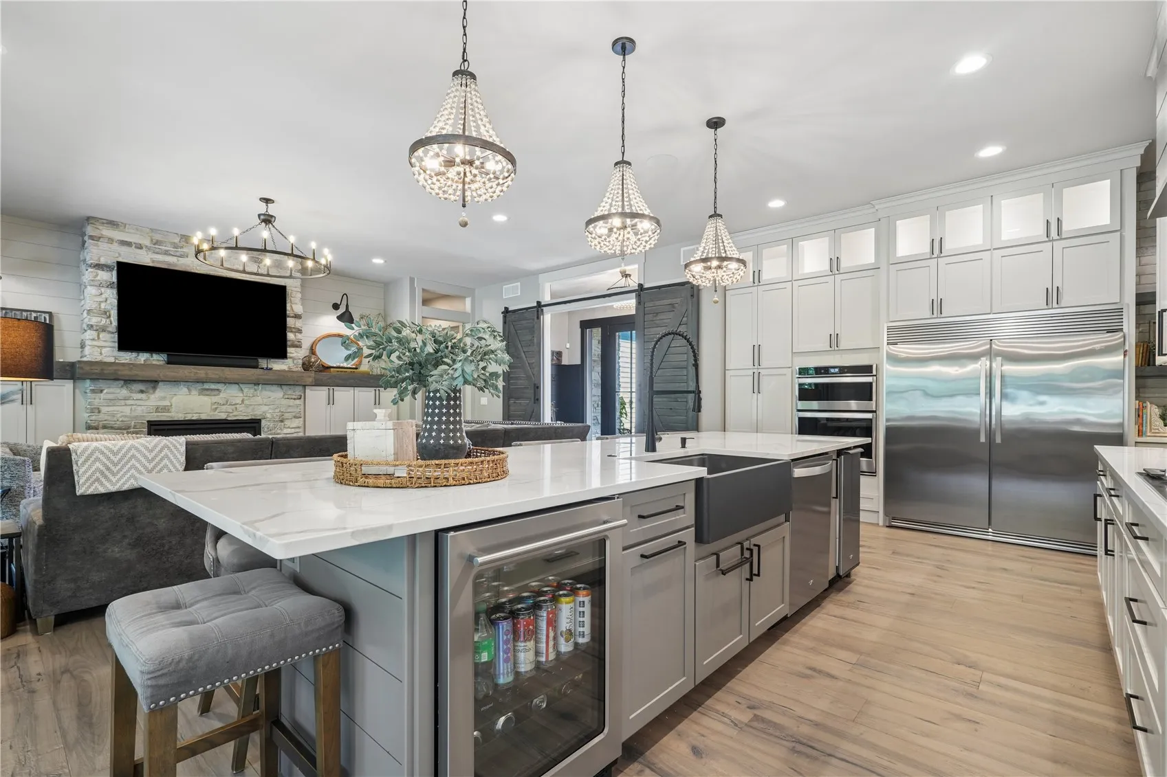 The 11ft island makes quite a statement. You will enjoy having the icemaker and mini beverage fridge when having pool days or entertaining.