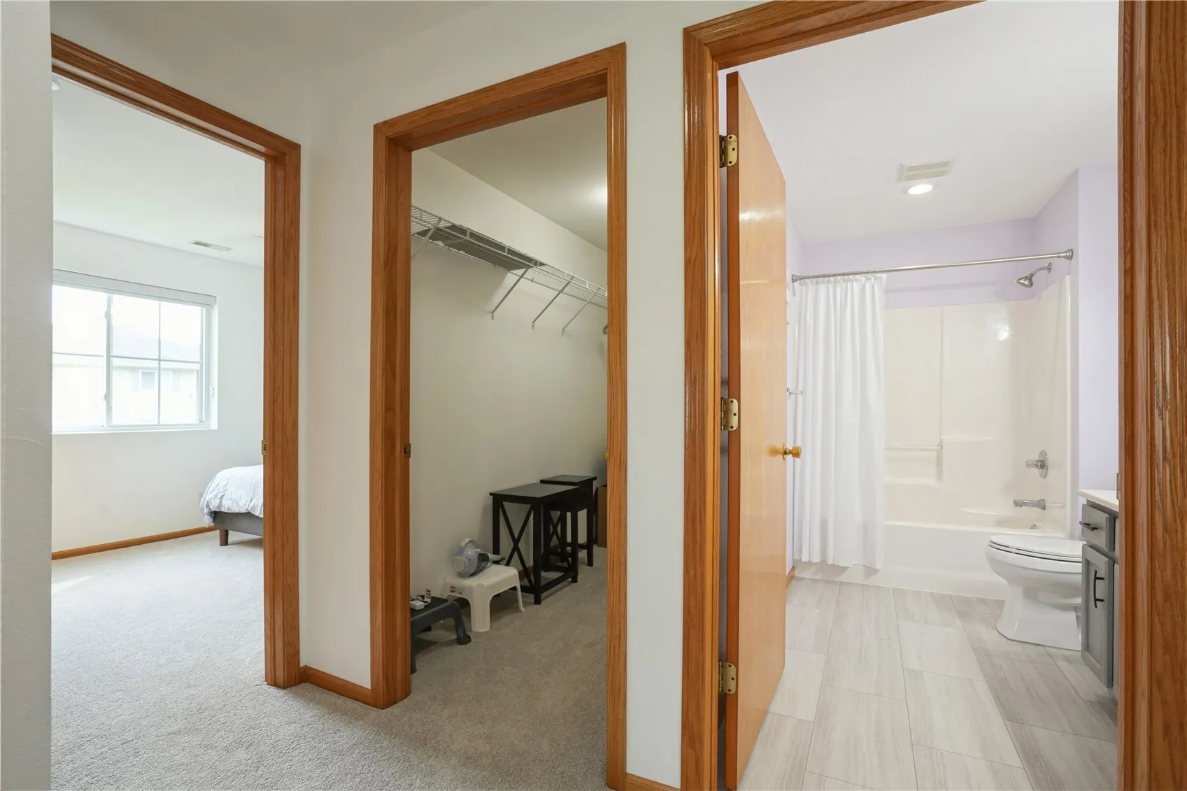 Bathroom has new flooring and toilet, Large storage closet between bathroom and 2nd bedroom, additional linen closet not pictured