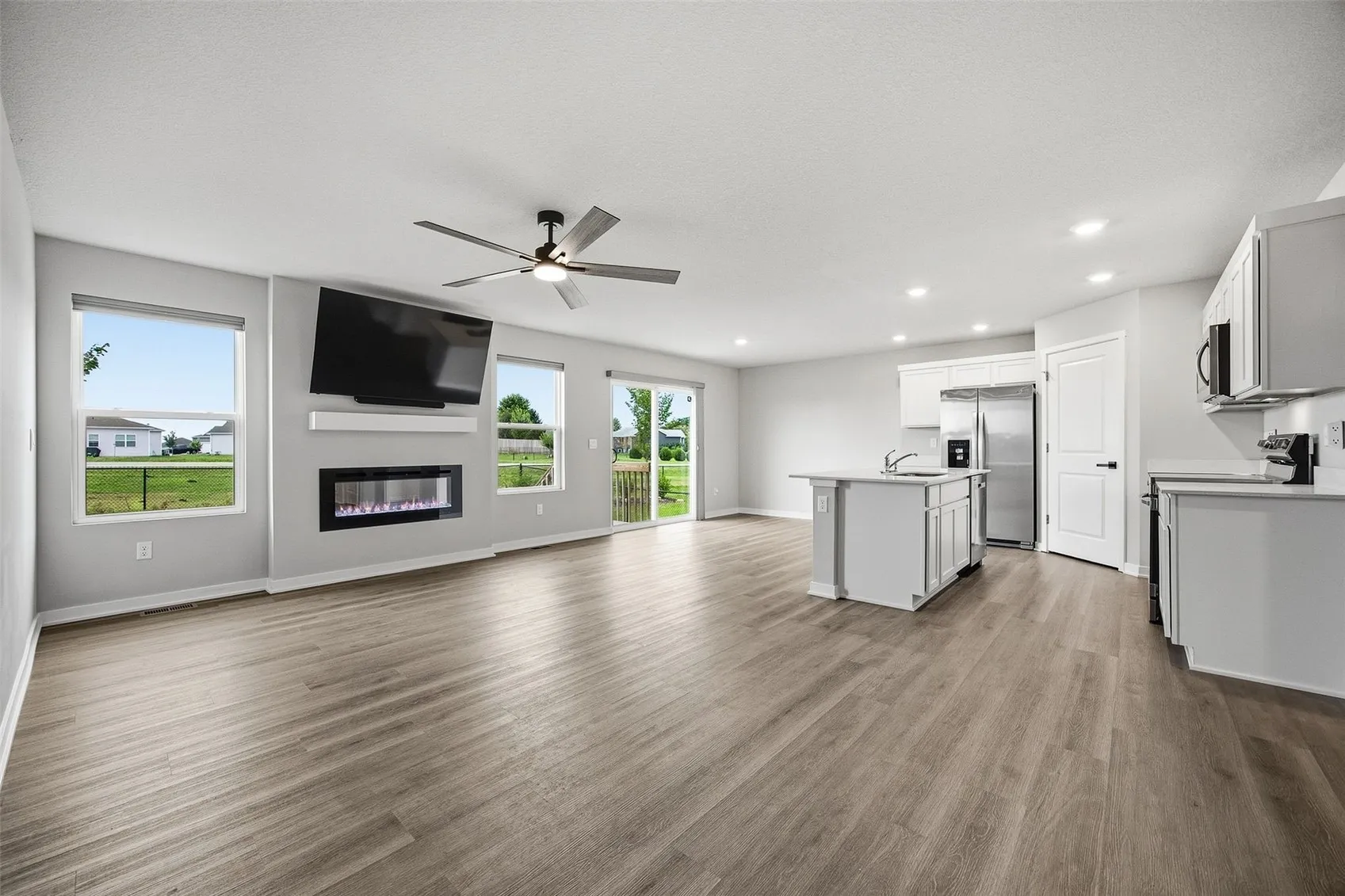 Open concept kitchen/dining/living room