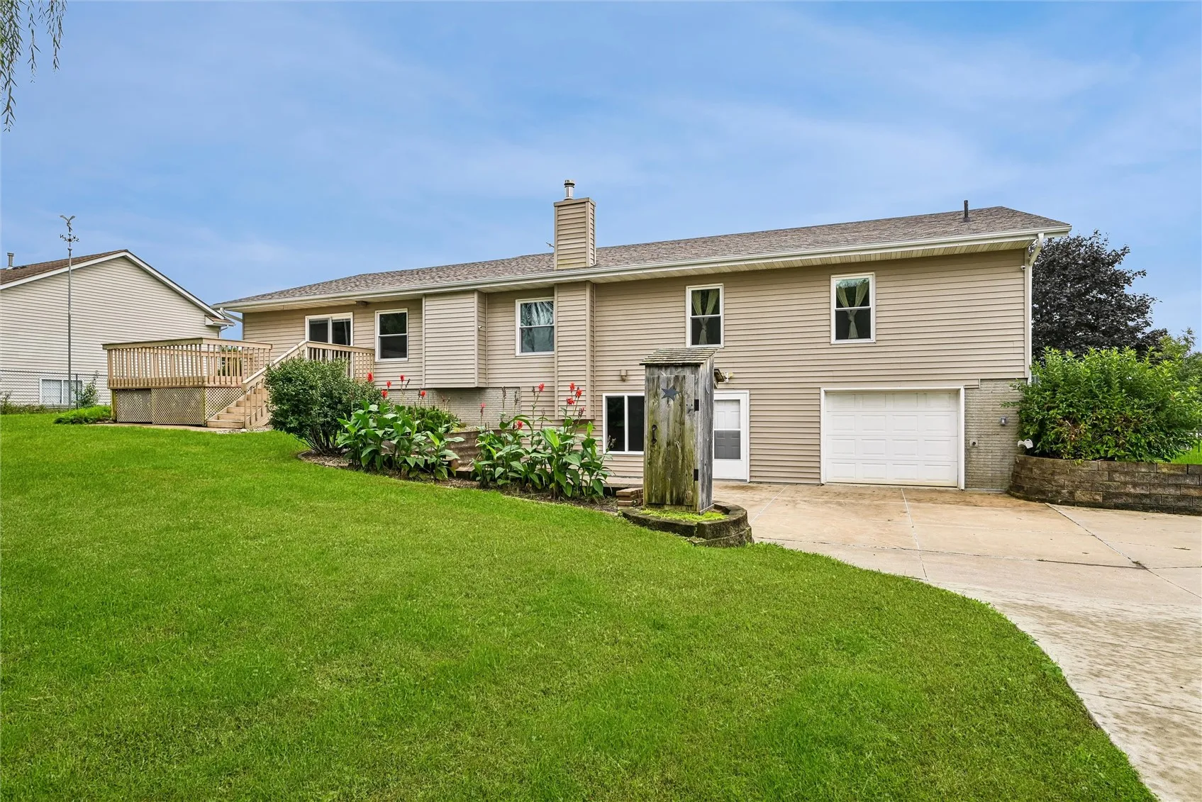 Spacious backyard featuring a dedicated outbuilding perfect for secure tool and equipment storage.