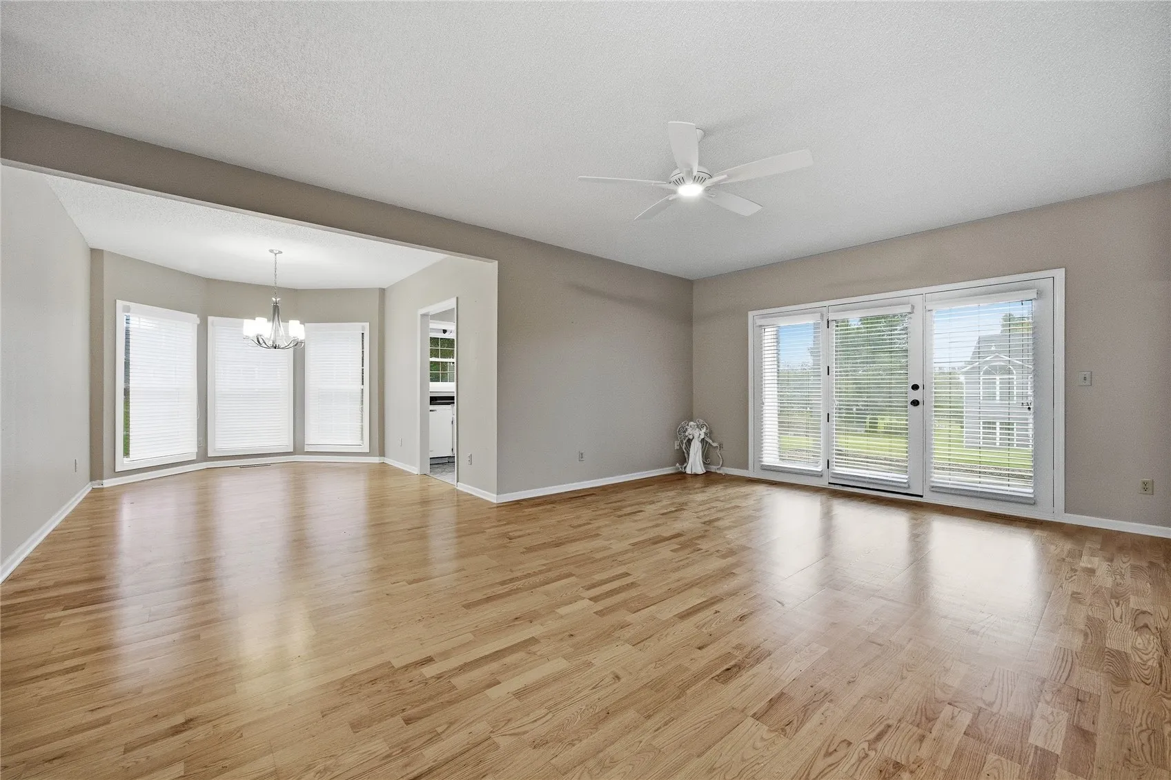 Large and OPEN living room connected to formall dining room/reading room/extended office.