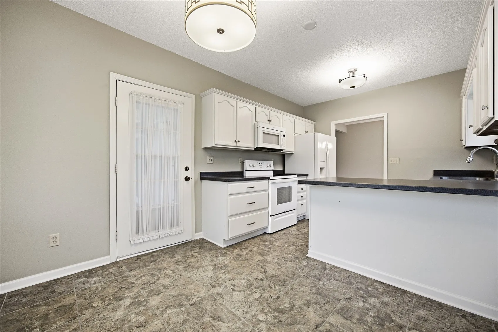 Access to the outdoor patio and easy access to the kitchen.