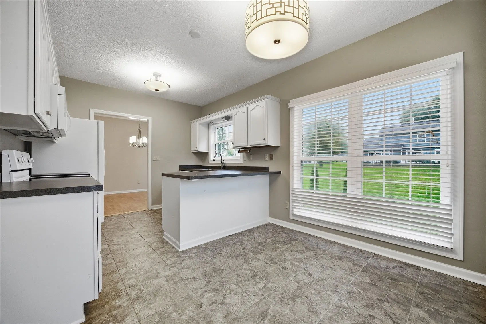 A very bright eat in kitchen or you make it a room that fits your needs.