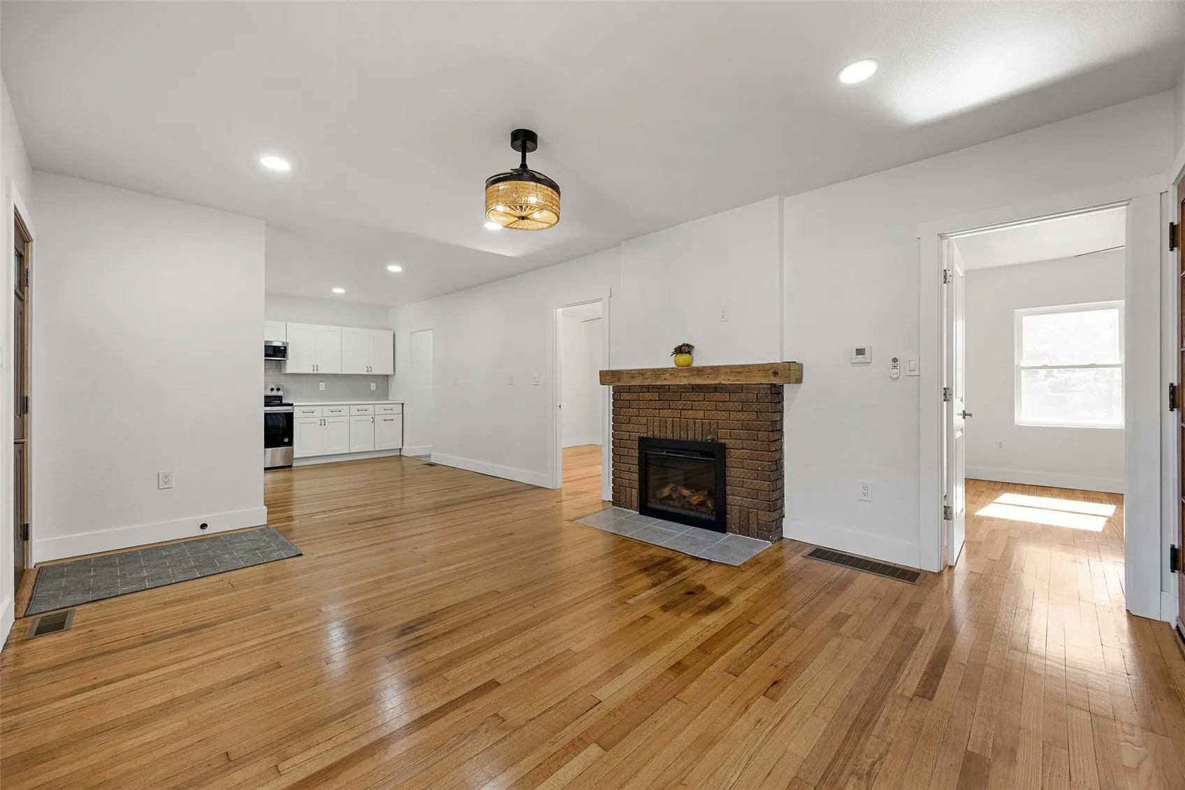 View from front corner of living room with 2nd bedroom straight back