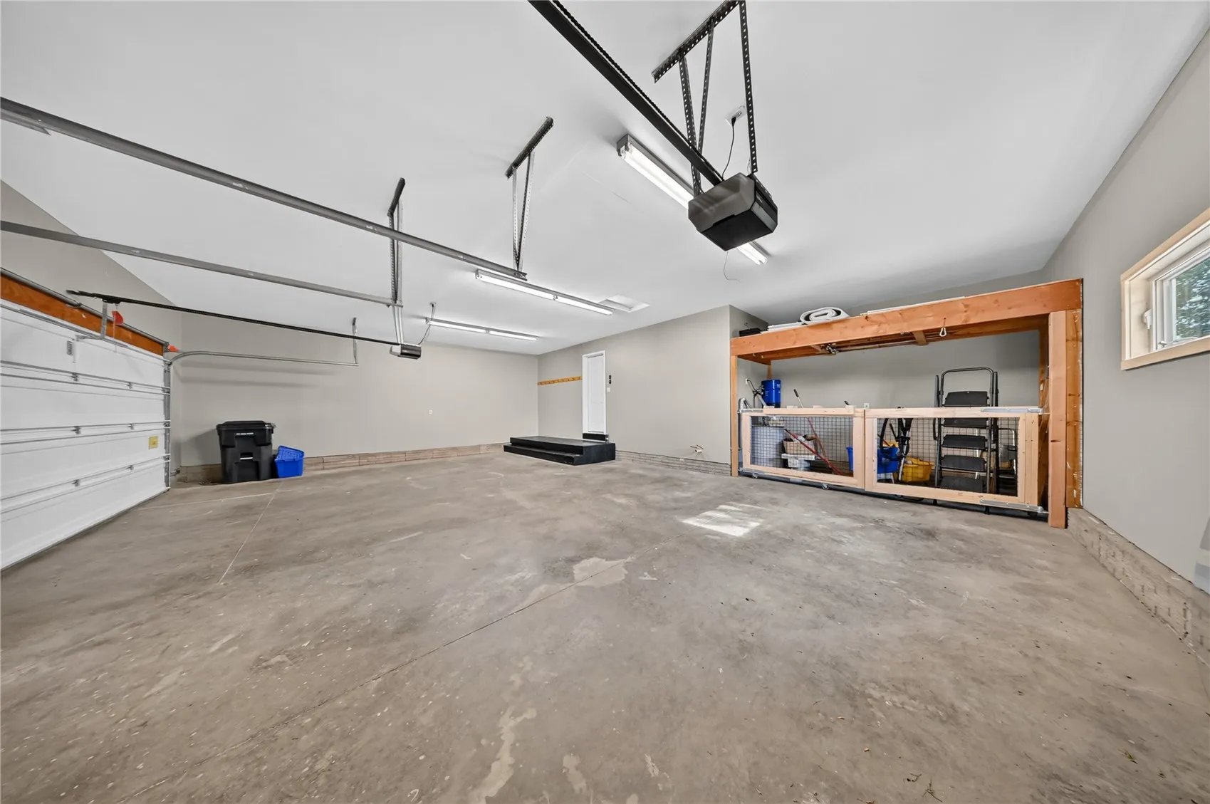 Attached 3 stall oversized garage
