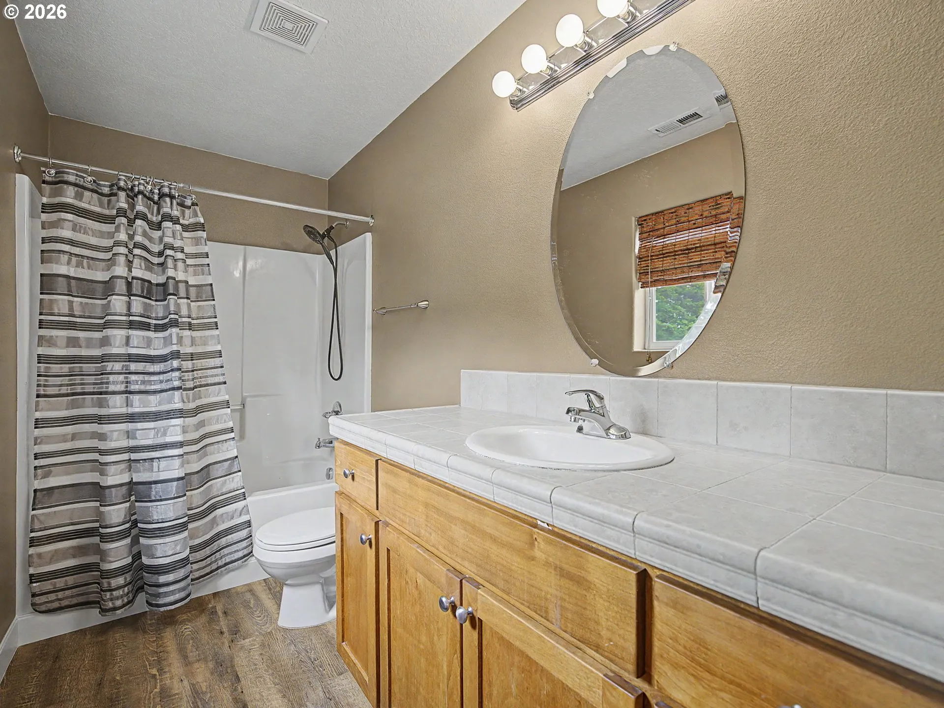 Primary Bedroom-Attached Bathroom