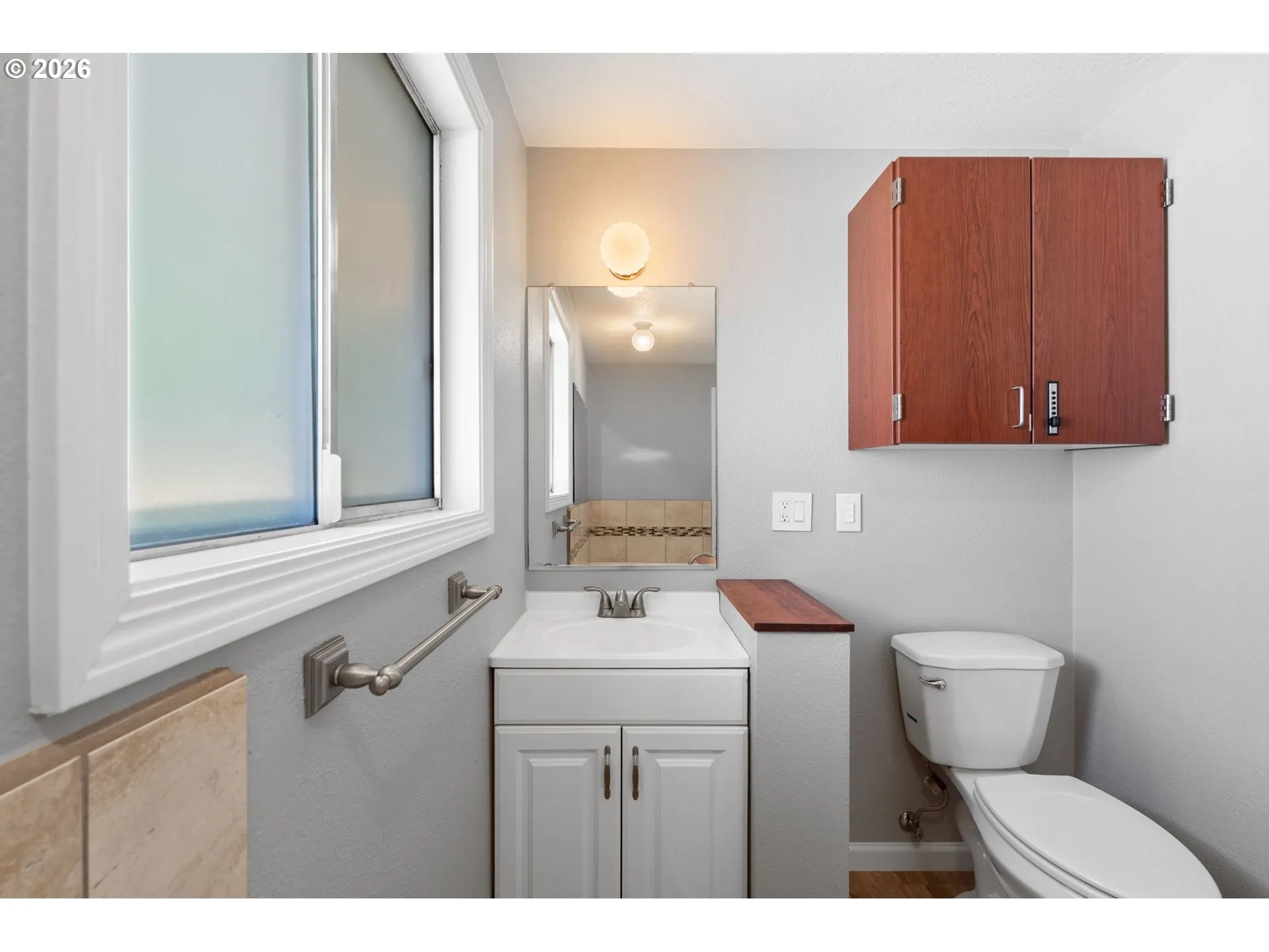 Primary Bedroom-Attached Bathroom