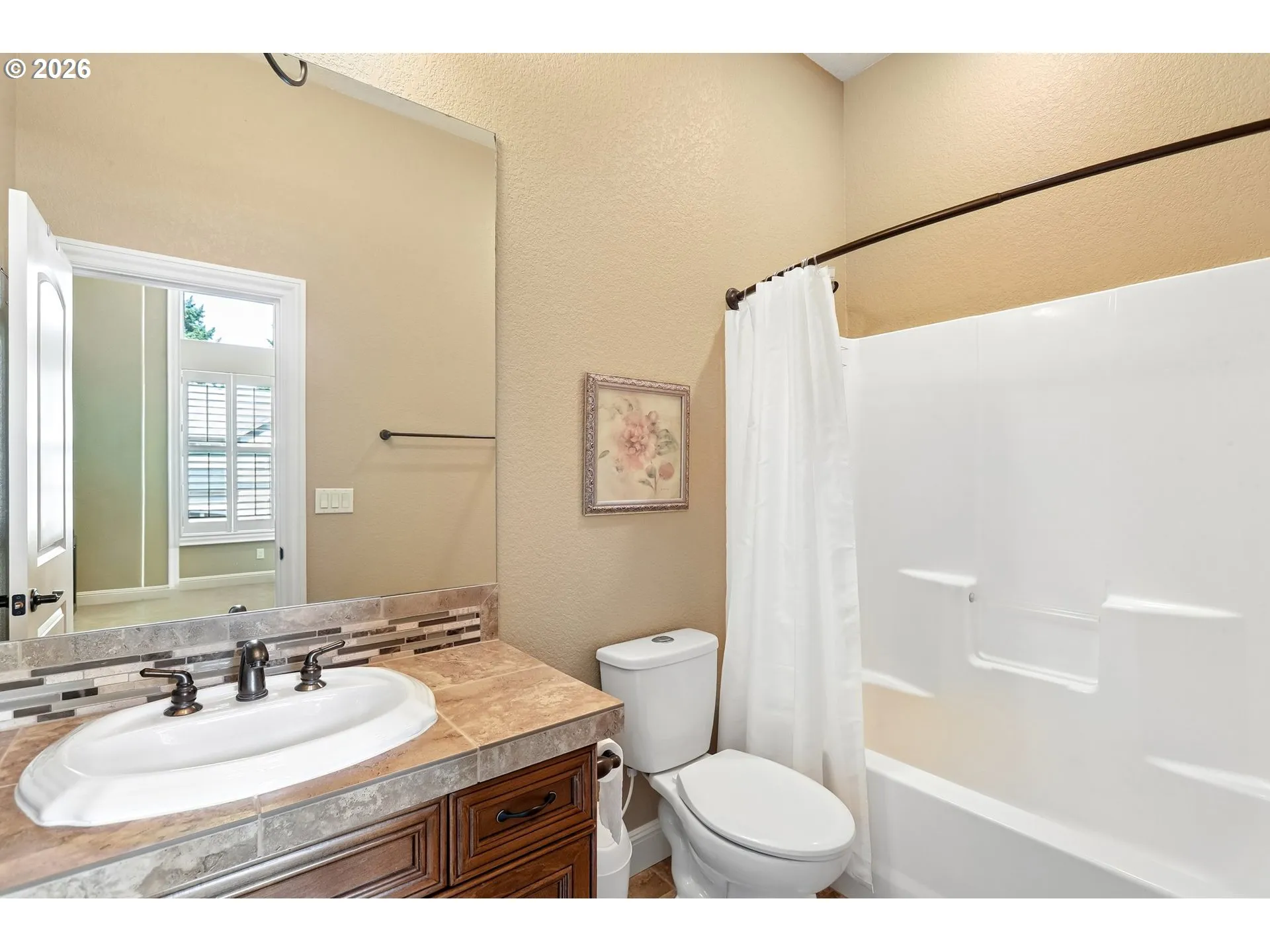 Primary Bedroom-Attached Bathroom
