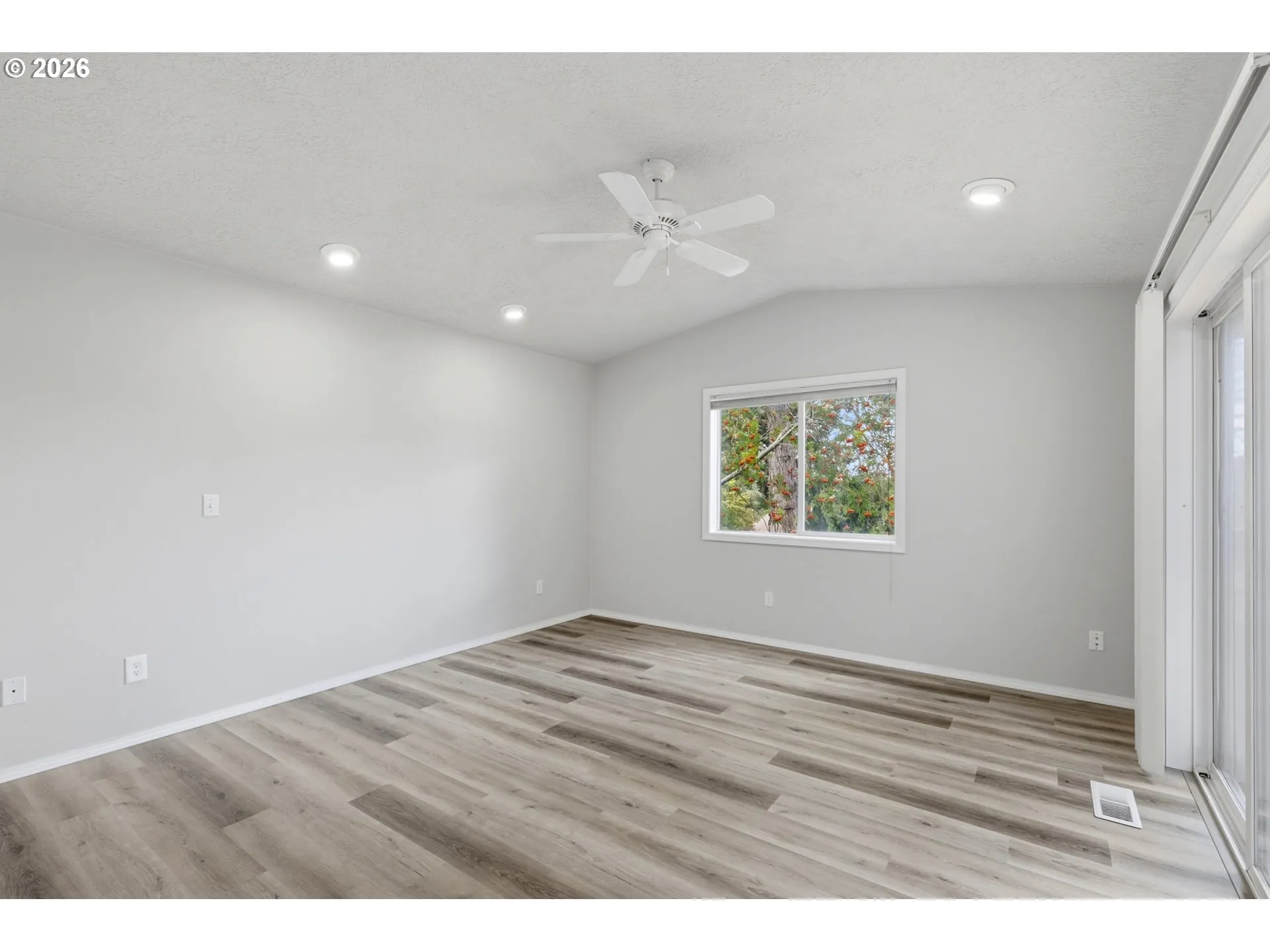 Owner's Suite Bedroom-Vaulted Ceilings