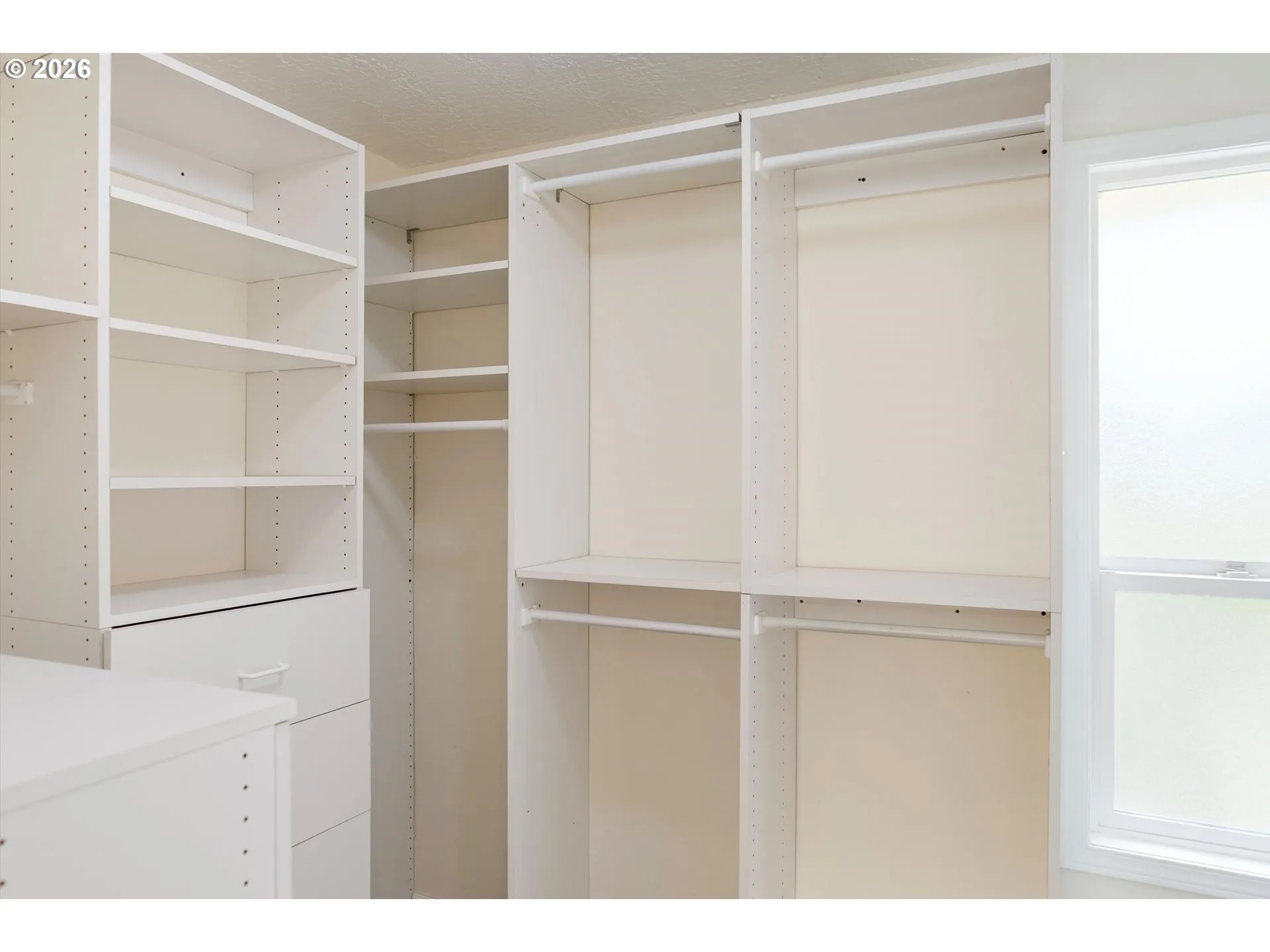 Primary Bedroom-Walk-In Closet
