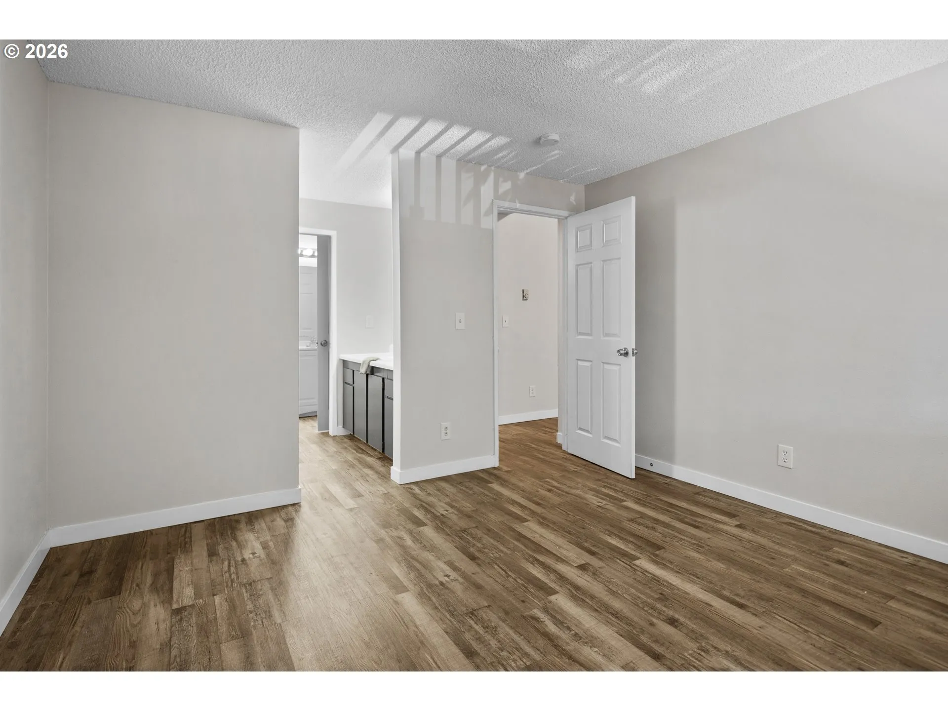 Primary Bedroom-Attached Bathroom