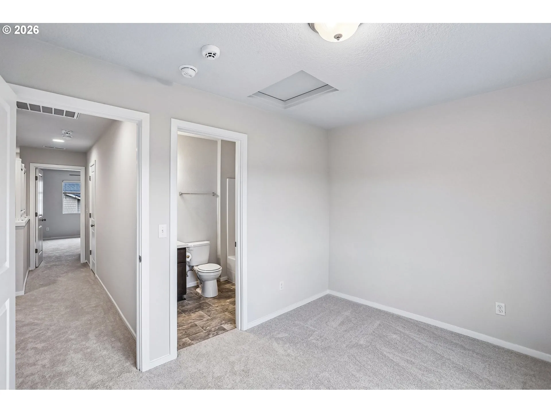 Primary Bedroom-Attached Bathroom