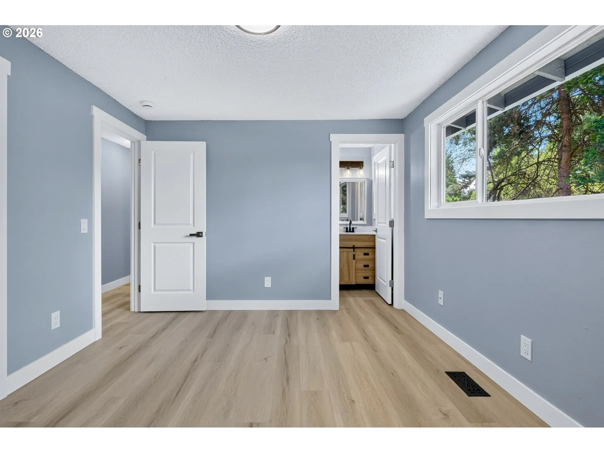 Primary Bedroom-Attached Bathroom