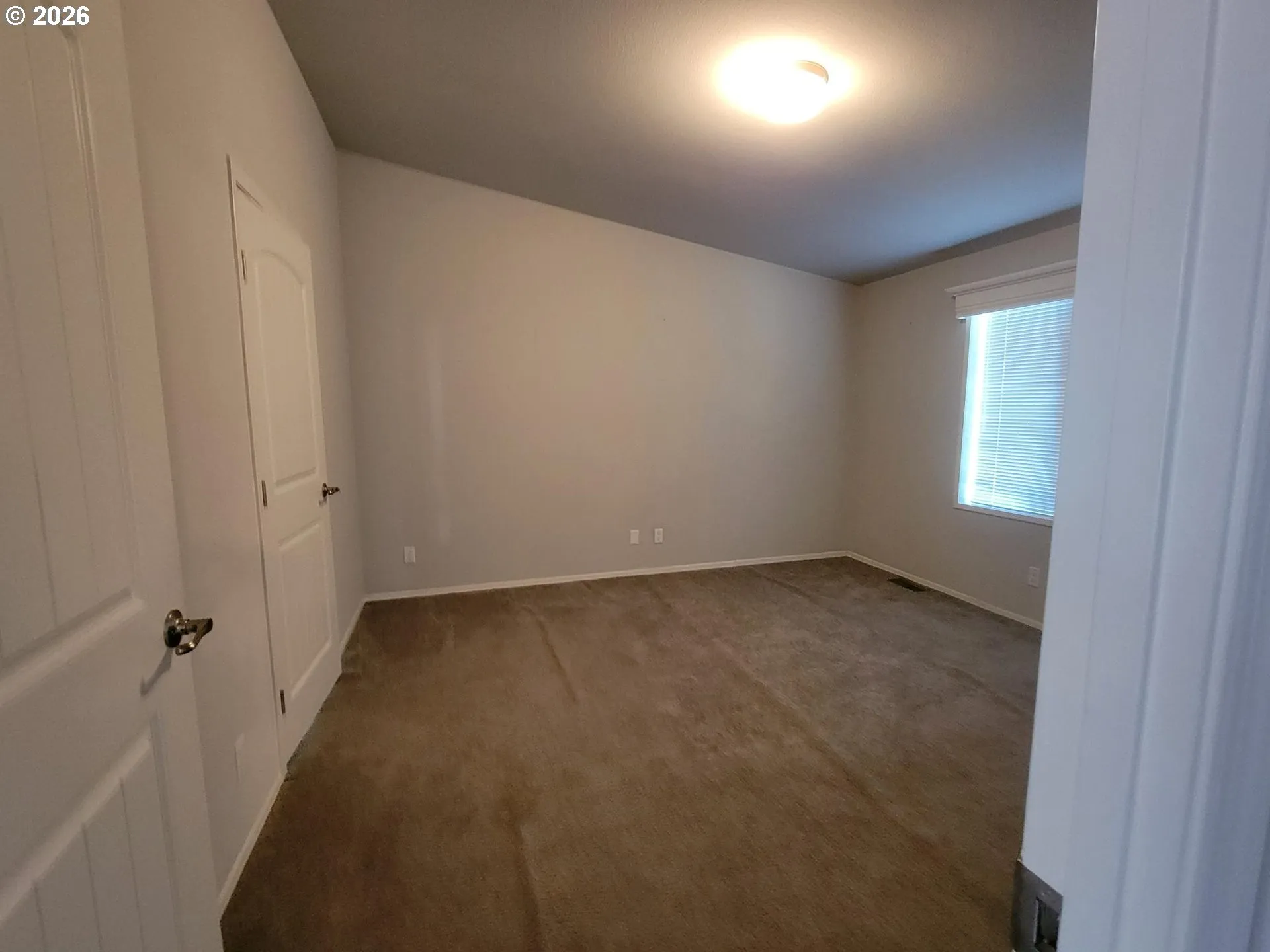 Owner's Suite Bedroom-Vaulted Ceilings