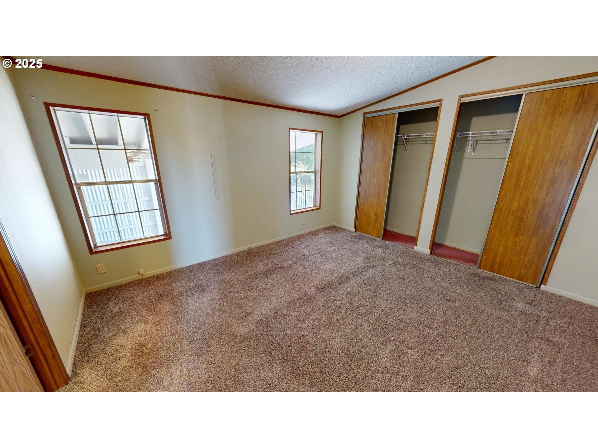 Owner's Suite Bedroom-Vaulted Ceilings