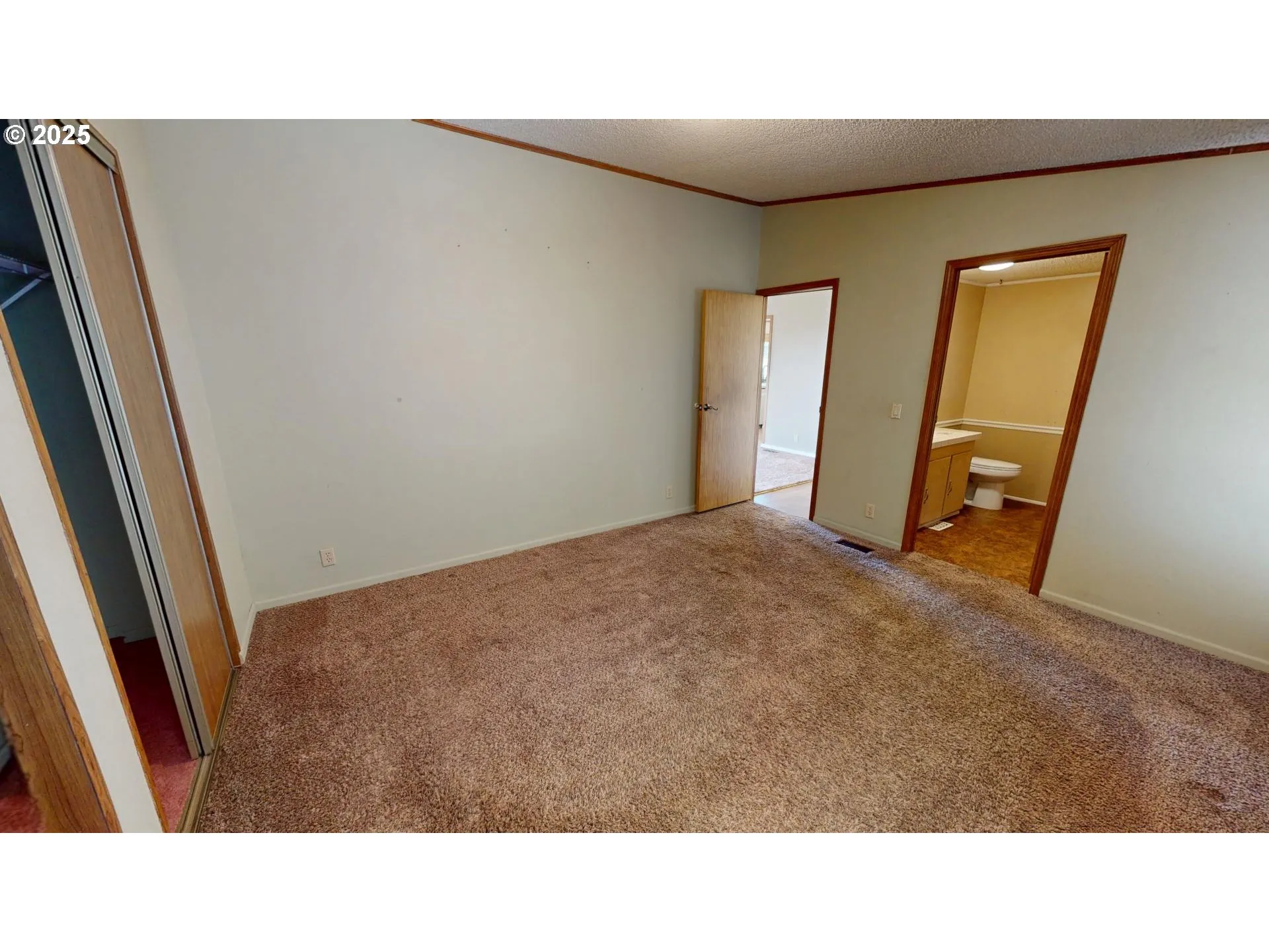 Owner's Suite Bedroom-Vaulted Ceilings
