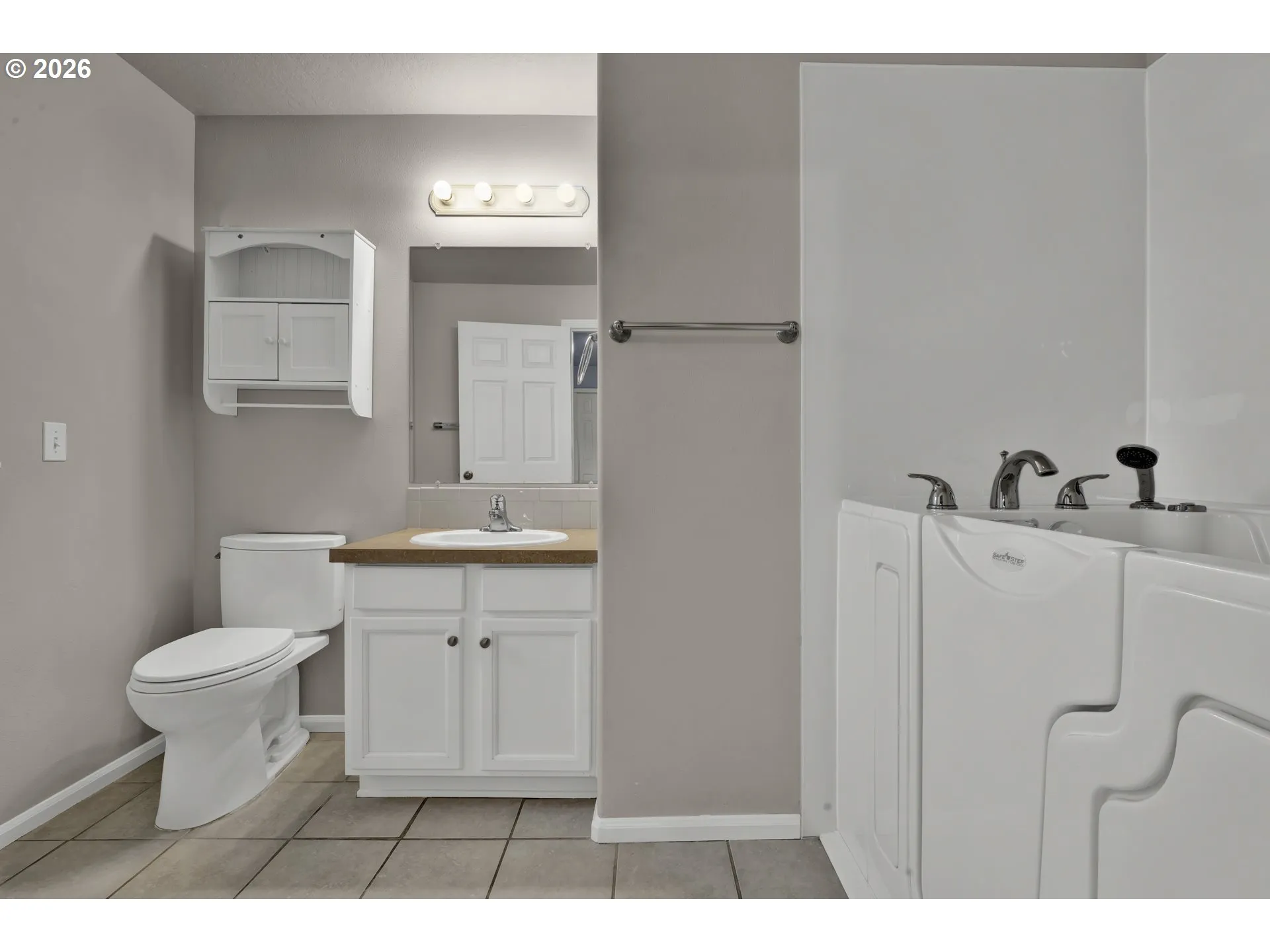 Primary Bedroom-Attached Bathroom