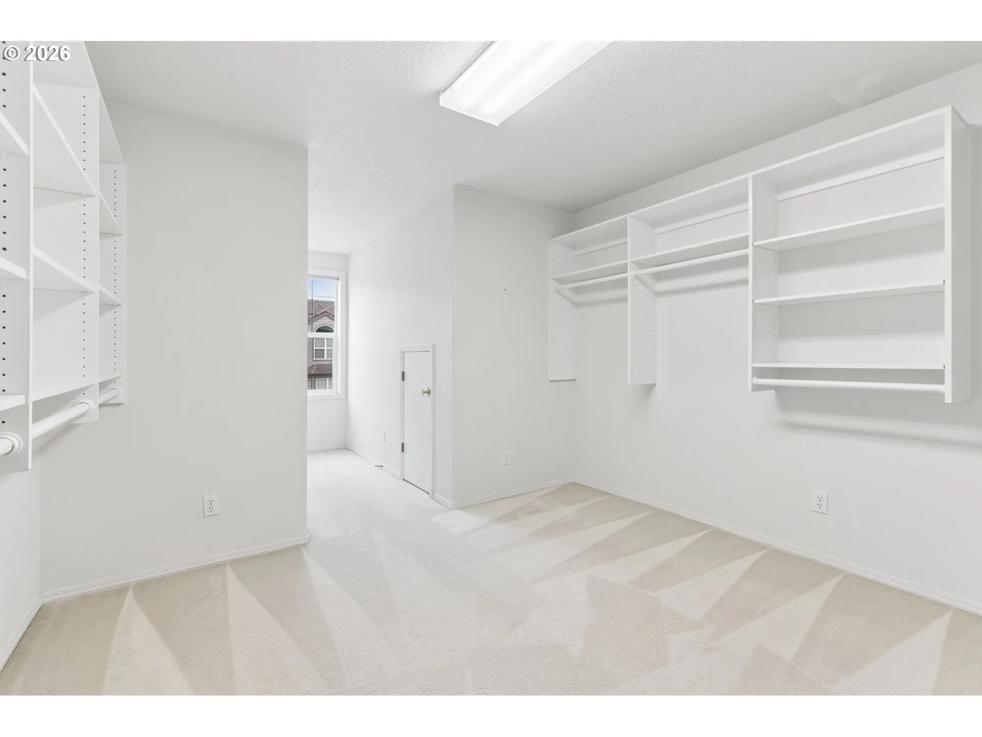 Primary Bedroom-Walk-In Closet