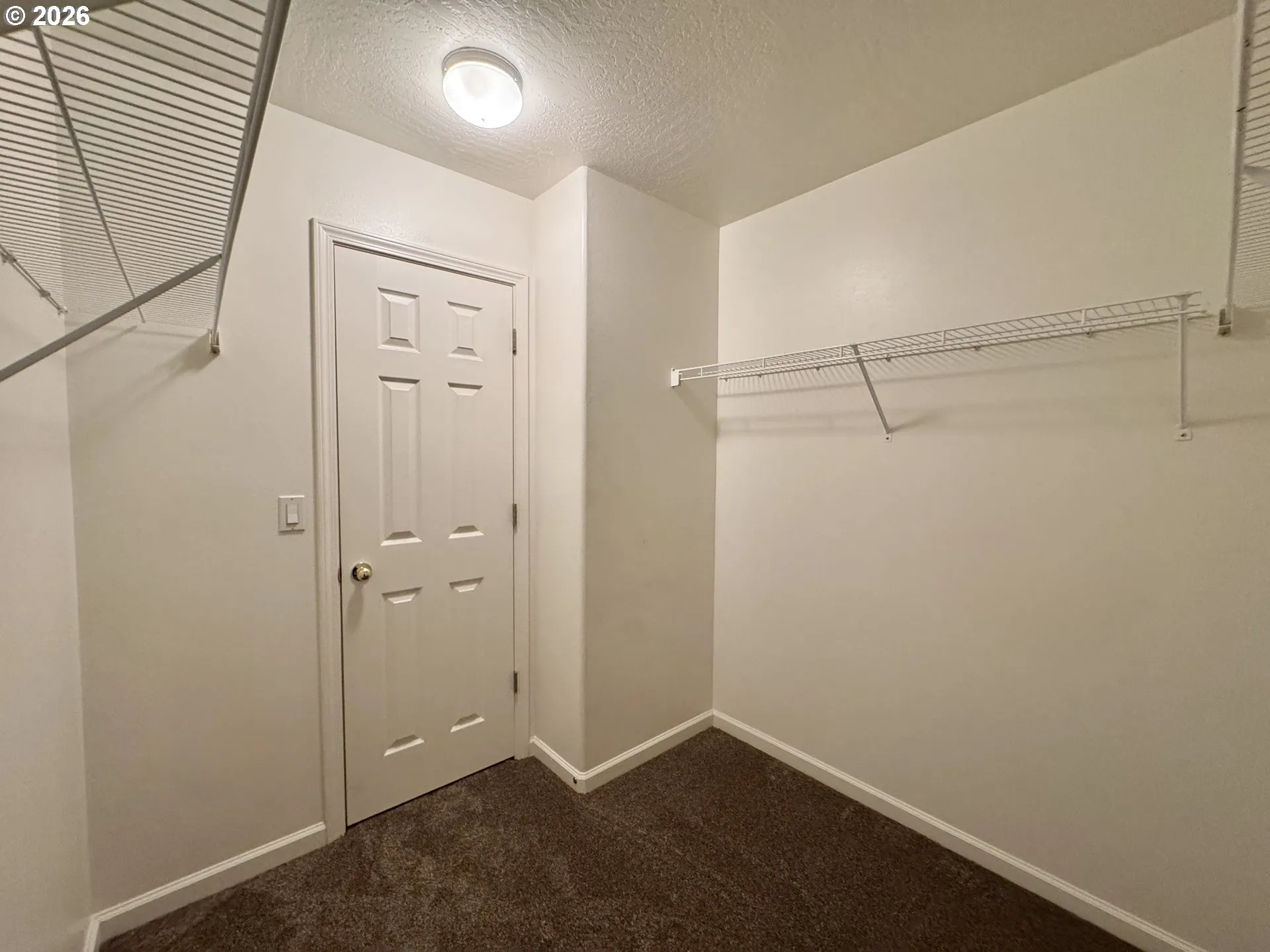 Primary Bedroom-Walk-In Closet