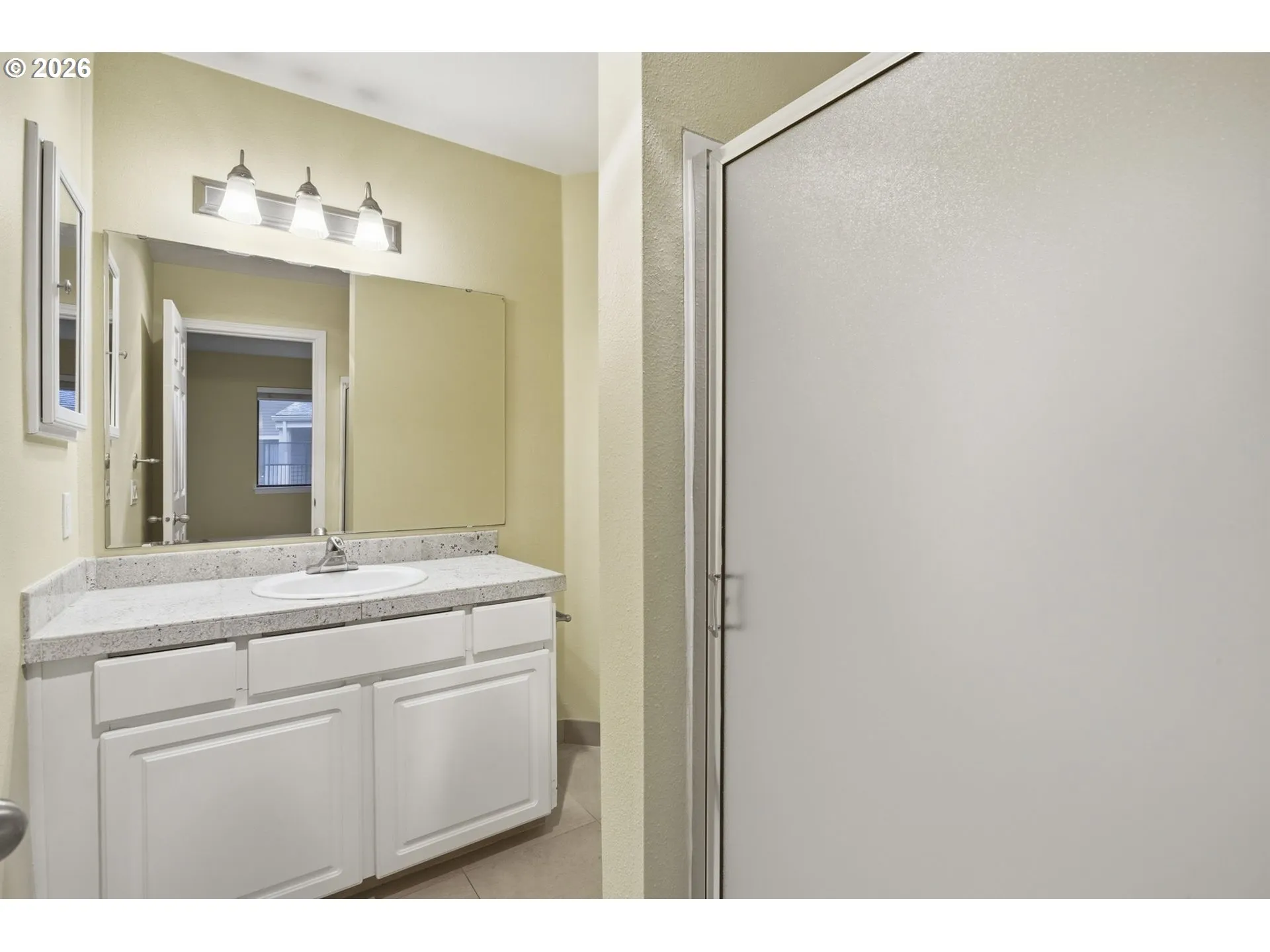 Primary Bedroom-Attached Bathroom
