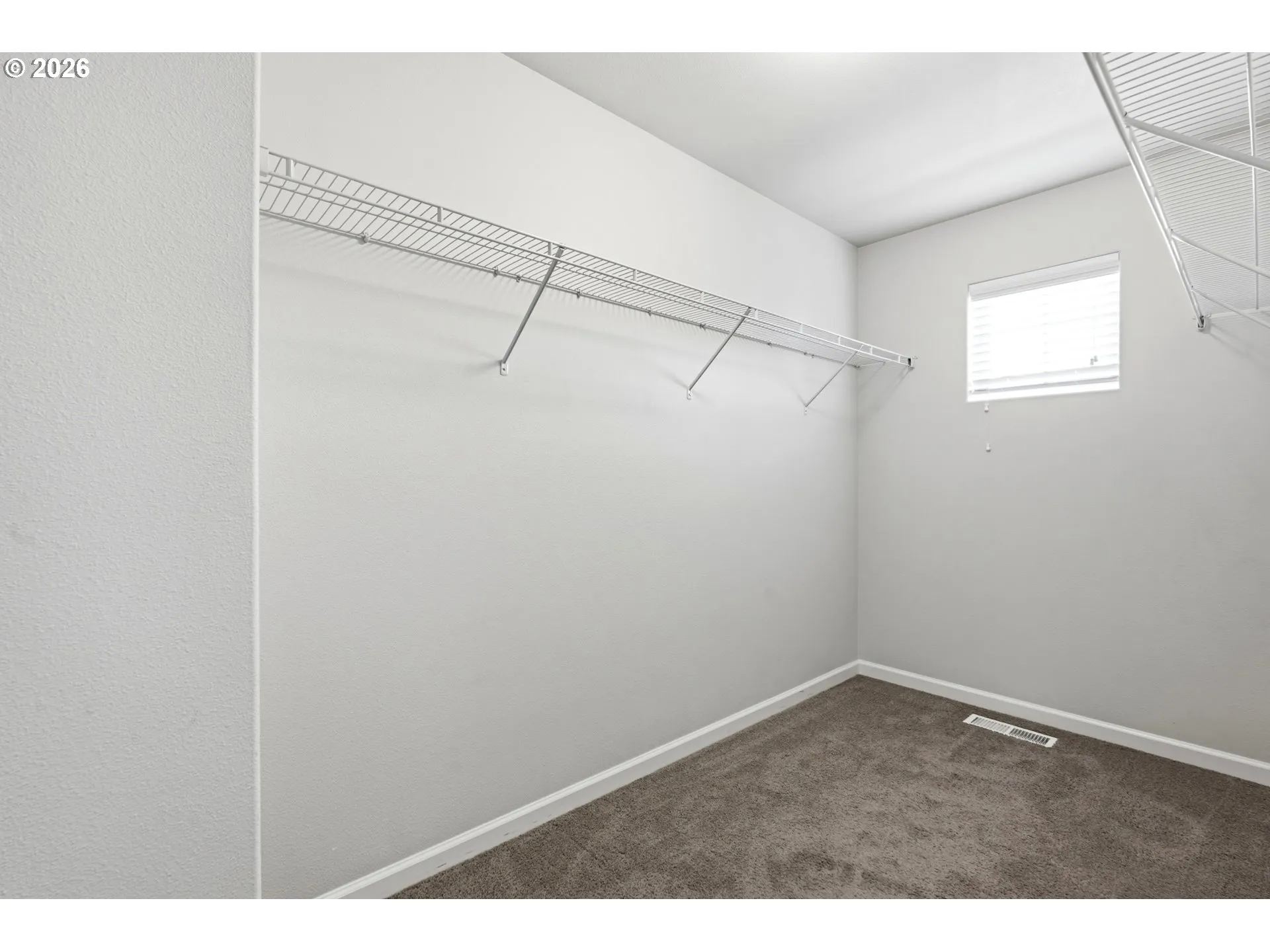 Primary Bedroom-Walk-In Closet