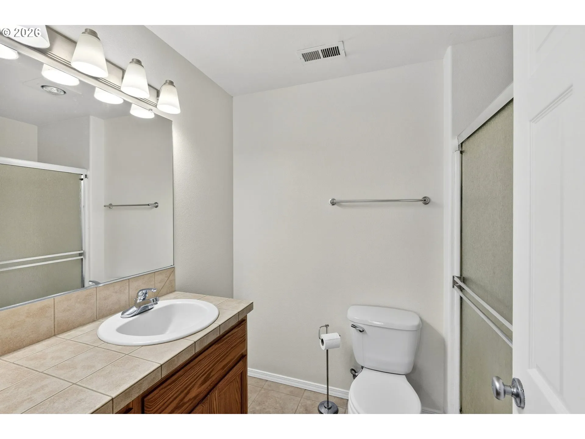Primary Bedroom-Attached Bathroom
