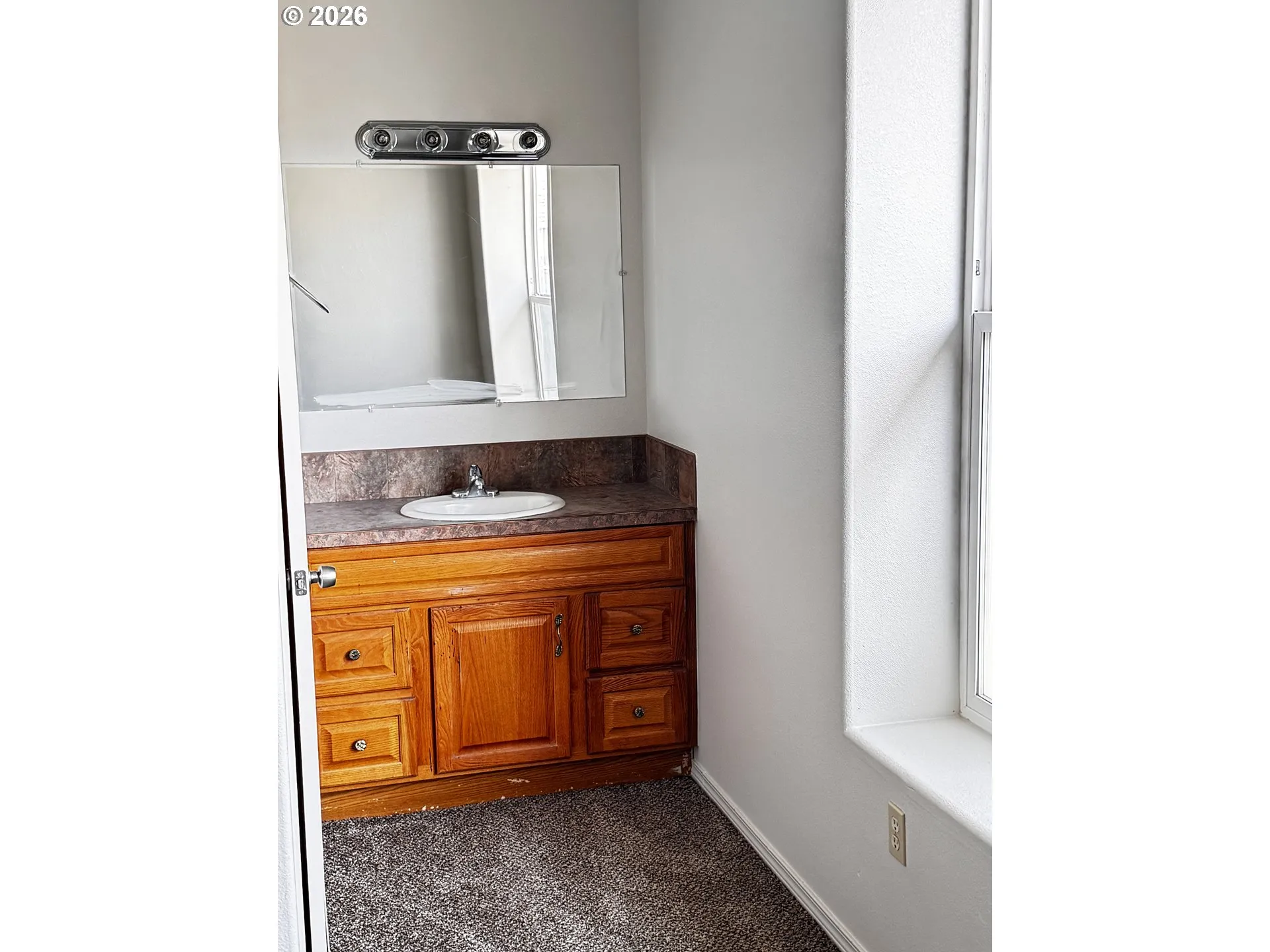 Primary Bedroom-Attached Bathroom